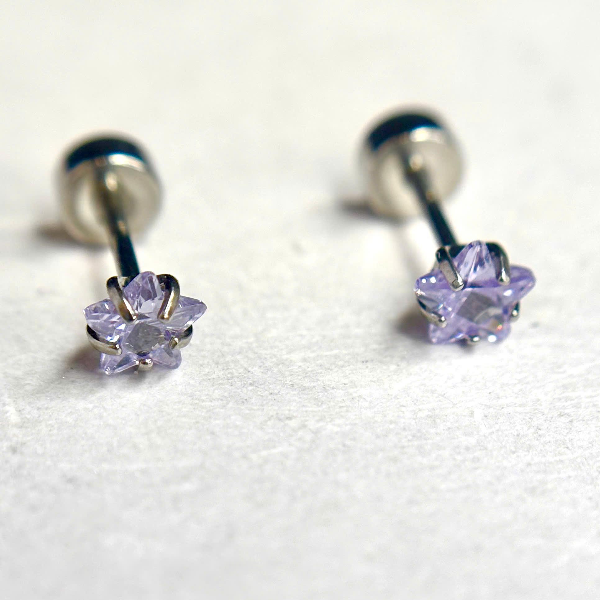 Khuyên kiểu kim cương sao tím nhạt 4mm