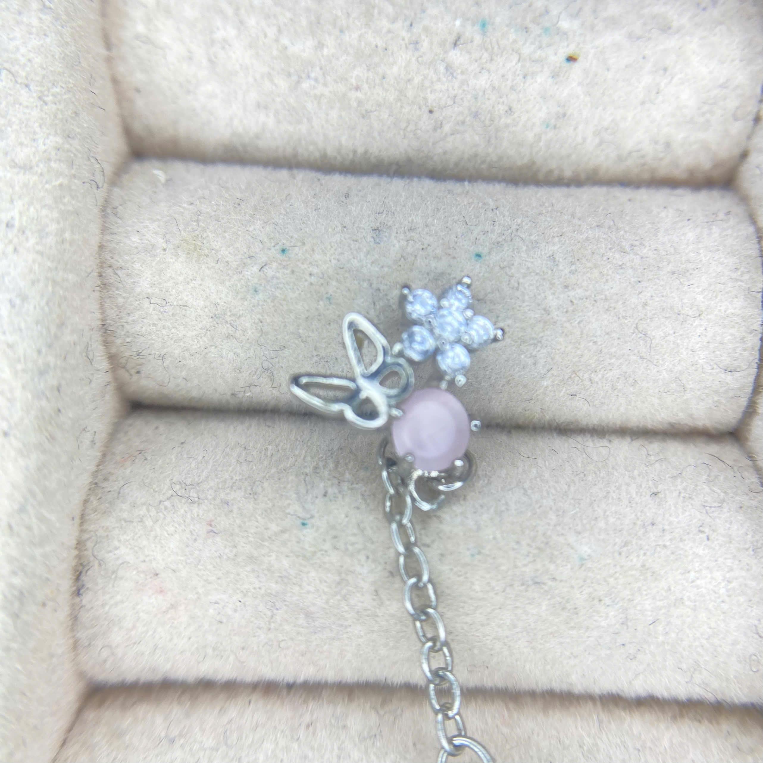 Khuyên kiểu xích bướm hồng rơi nơ.