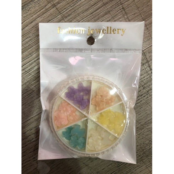 Phụ kiện gấu nơ hoa mã 13