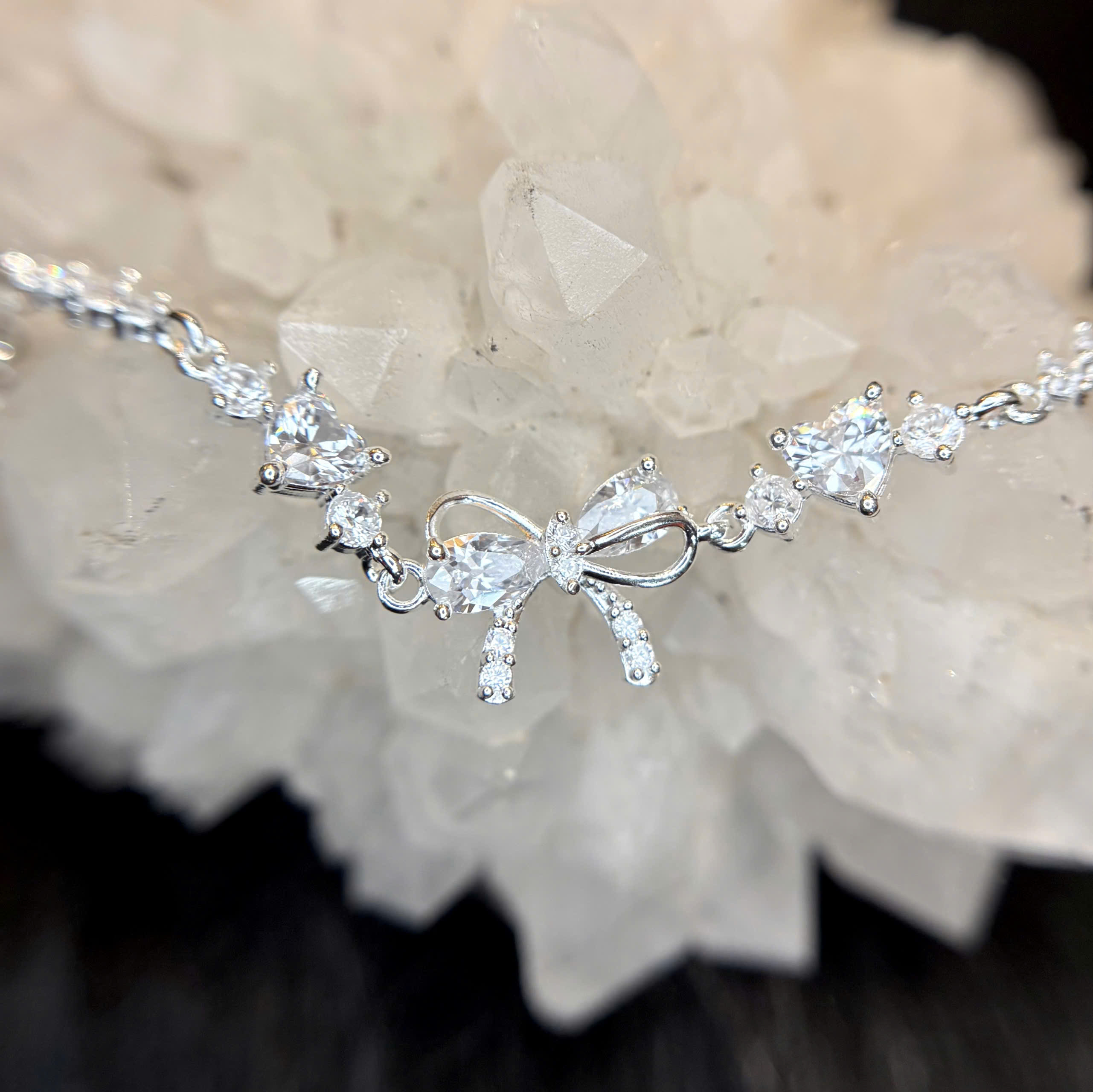 Vòng tay bạc xi bạch kim nơ trắng