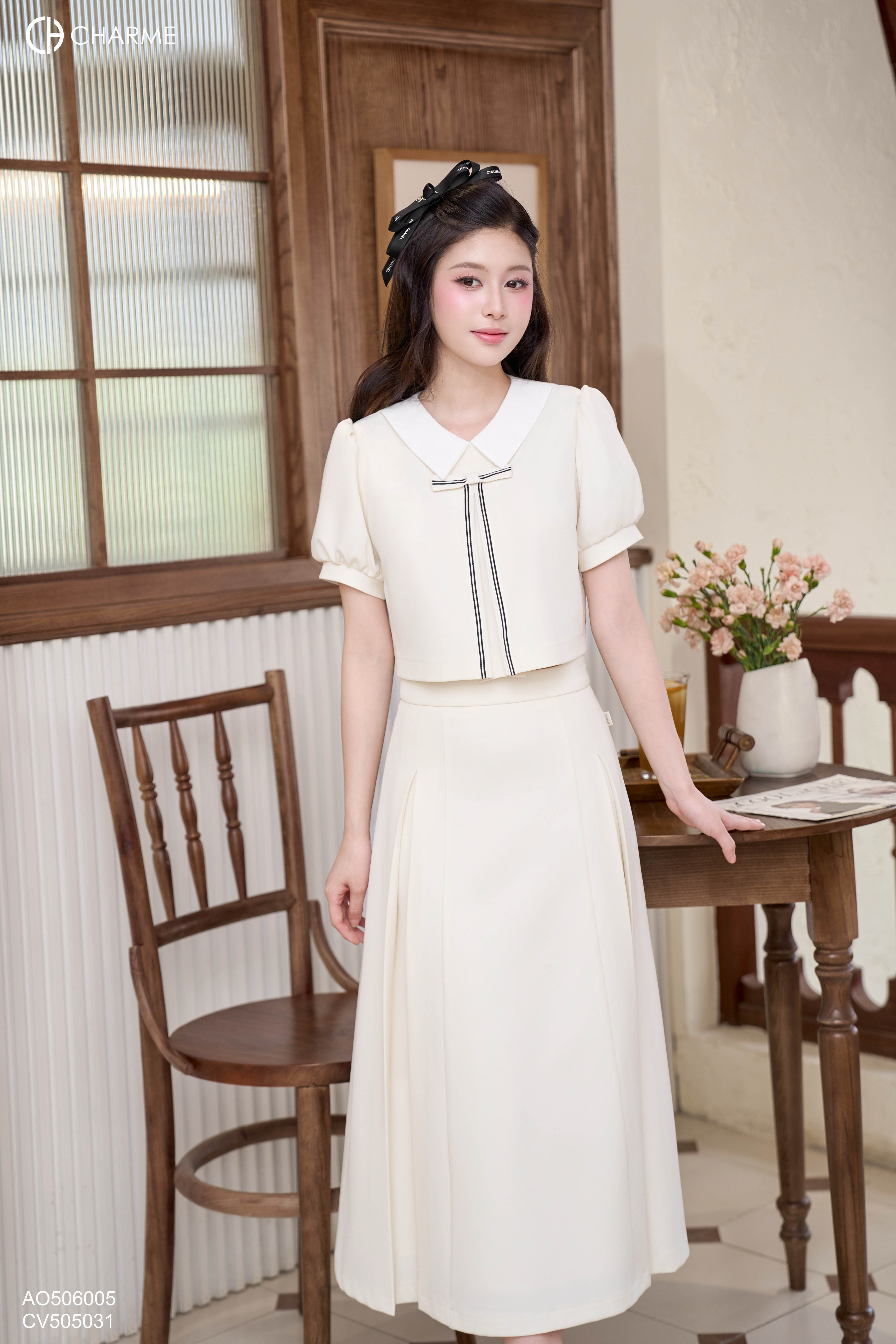 Áo dáng lửng nơ ngực