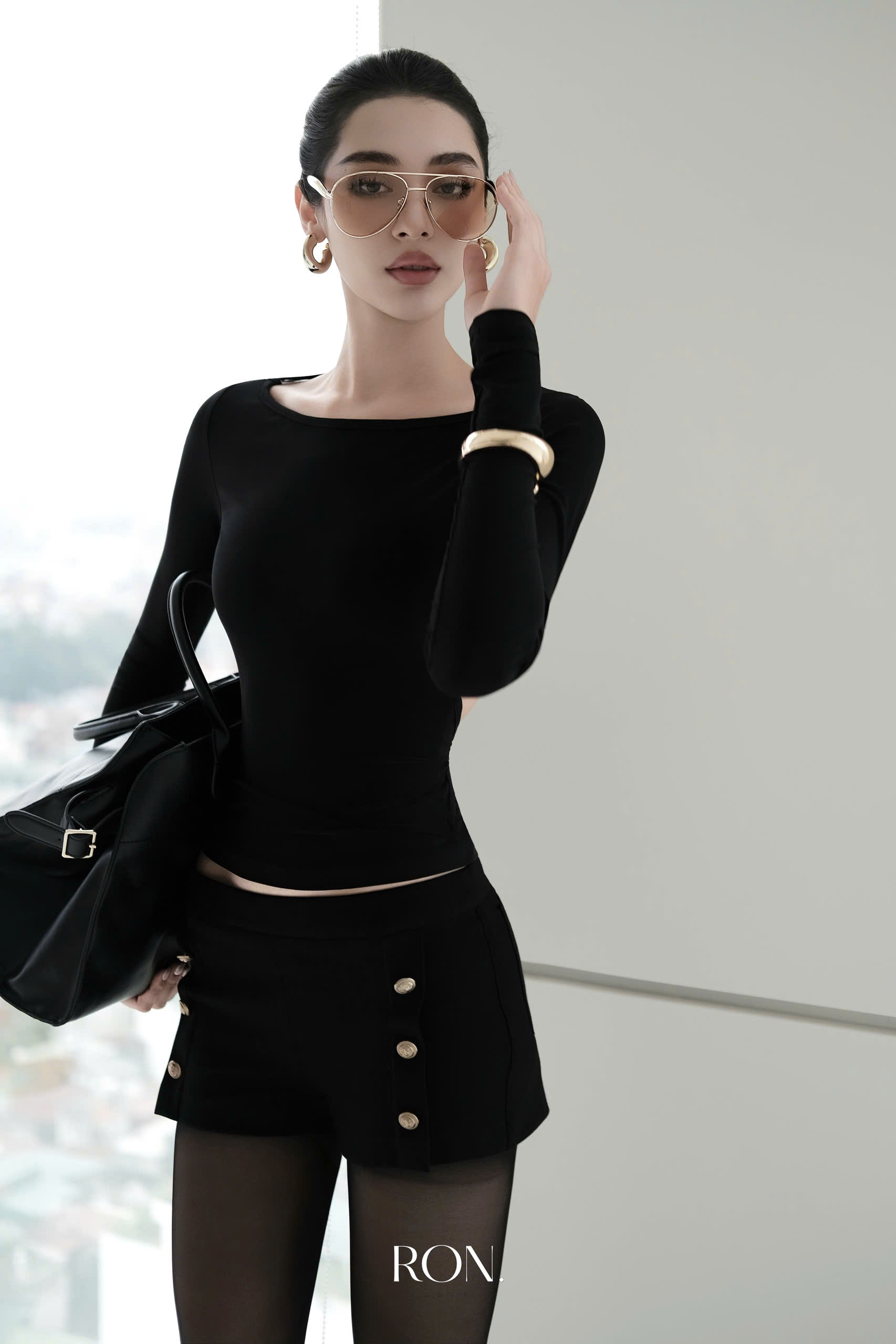 Quần đùi cúc đồng