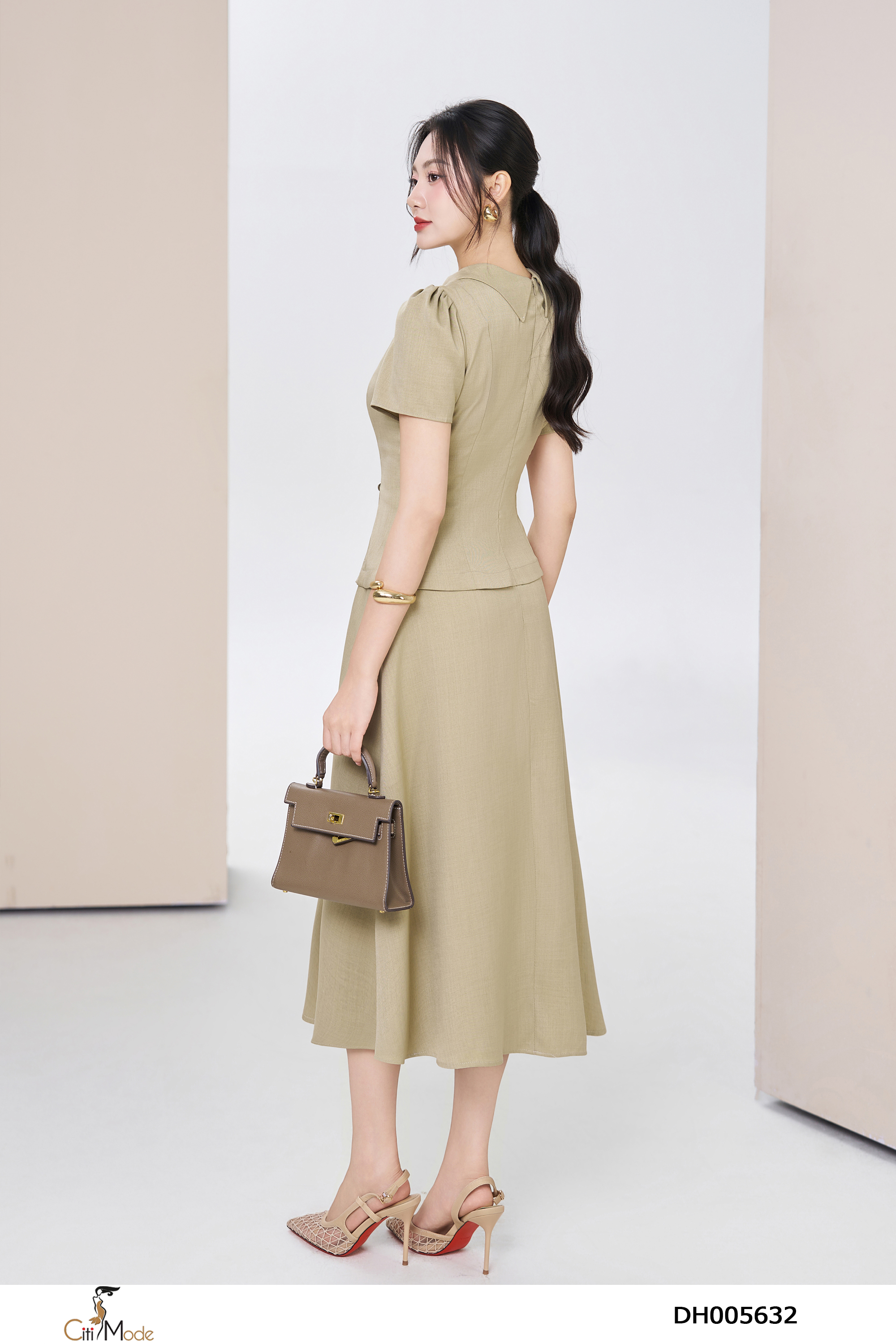 Đầm xòe peplum bơ cổ sen đính nơ