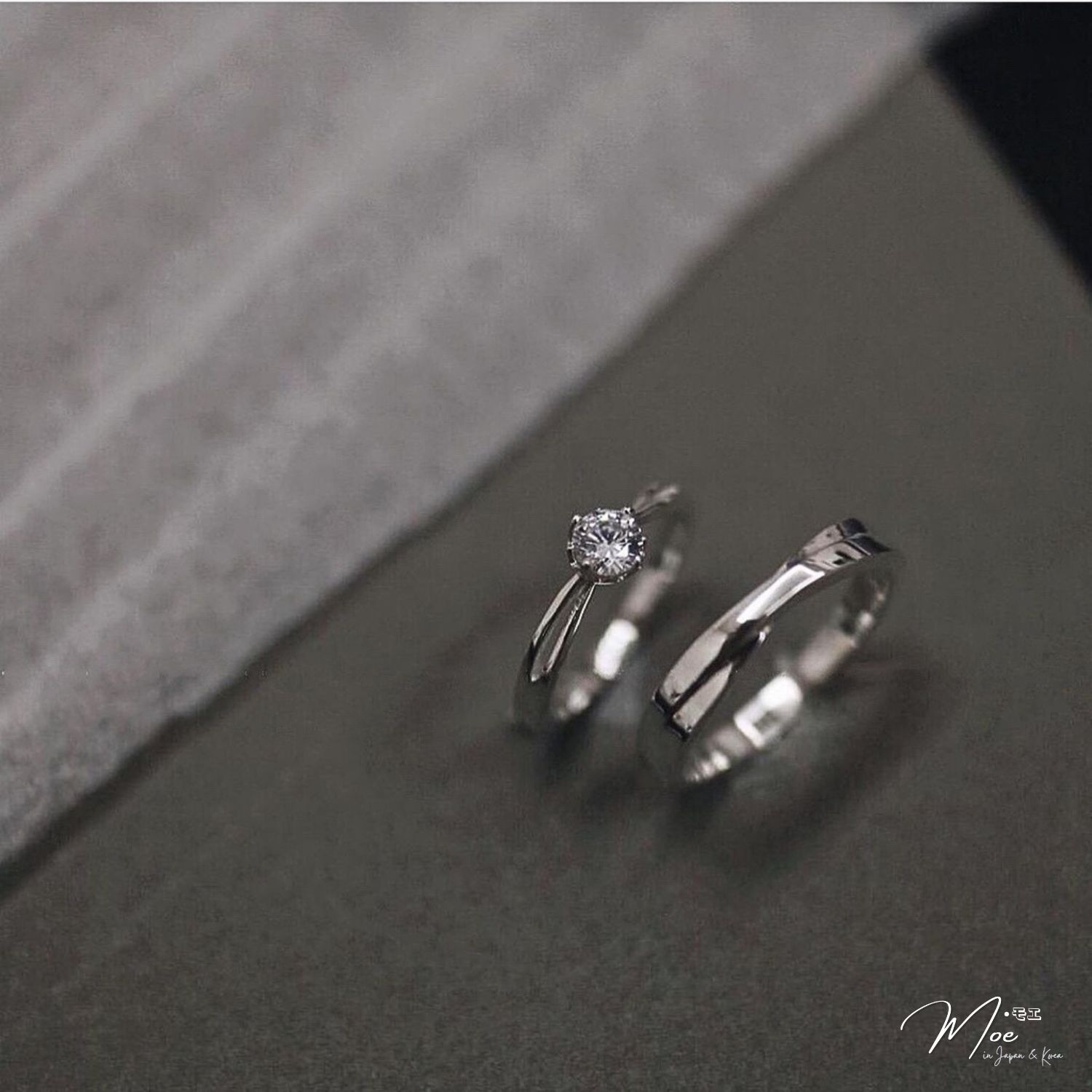 ĐN77 - Nhẫn đôi viền chéo đá chủ basic