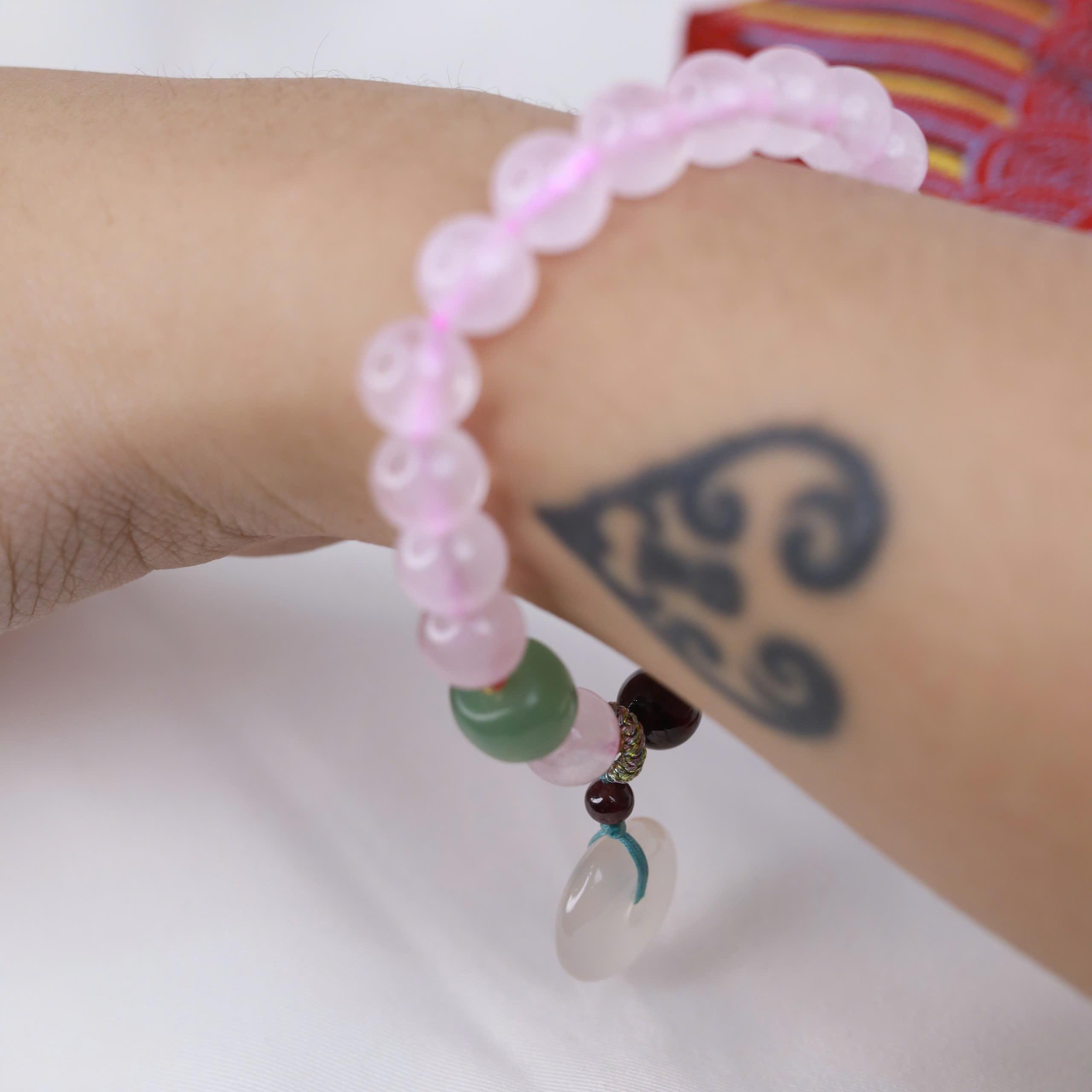 Vòng tay thạch anh hồng mix đồng điếu