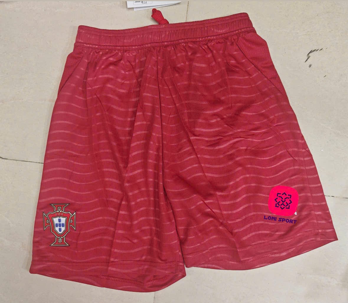 Quần BĐN sân nhà đỏ WC26