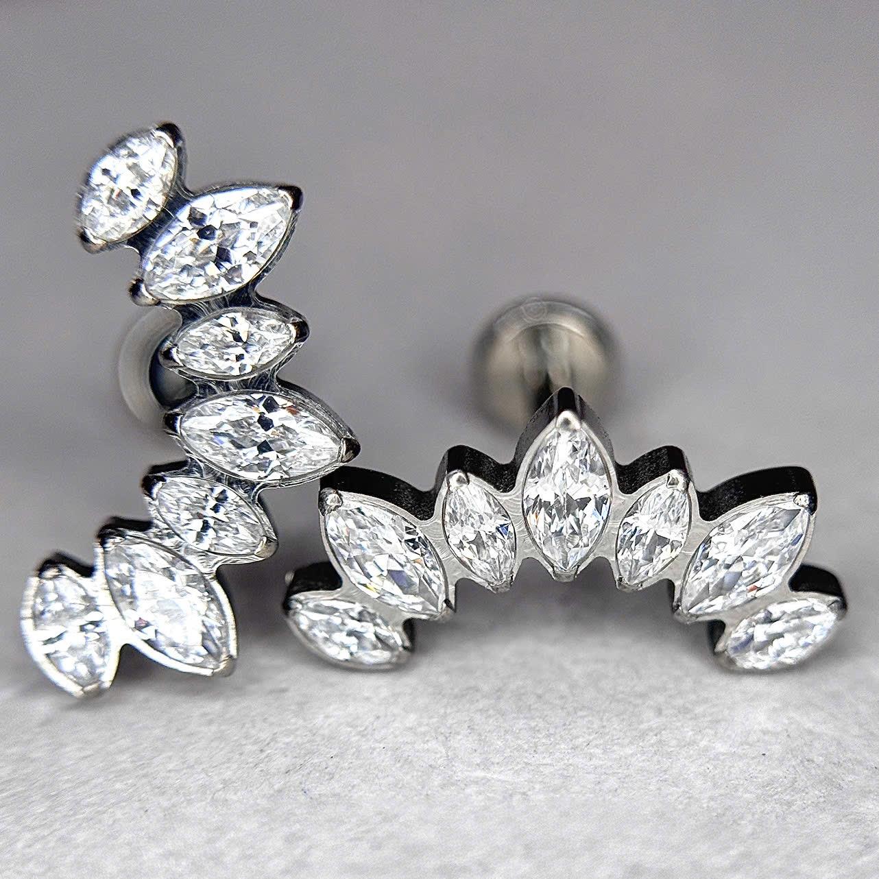 Khuyên kiểu titan 7 lá kim cương bo viền