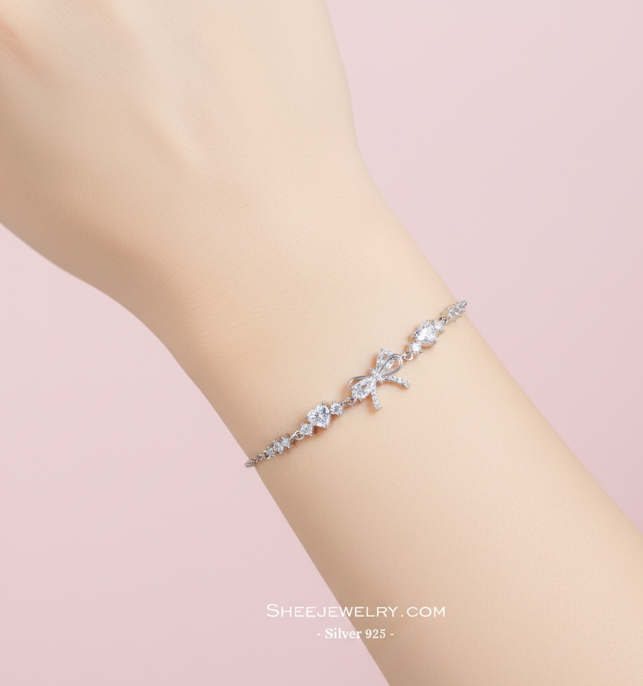  icon video play     Chia sẻ:  0 Vòng tay bạc nữ Shee Silver 925 đính đá hồng tim & nơ – phụ kiện xinh xắn, tôn da, quà tặng lãng mạn_thumbnail_3