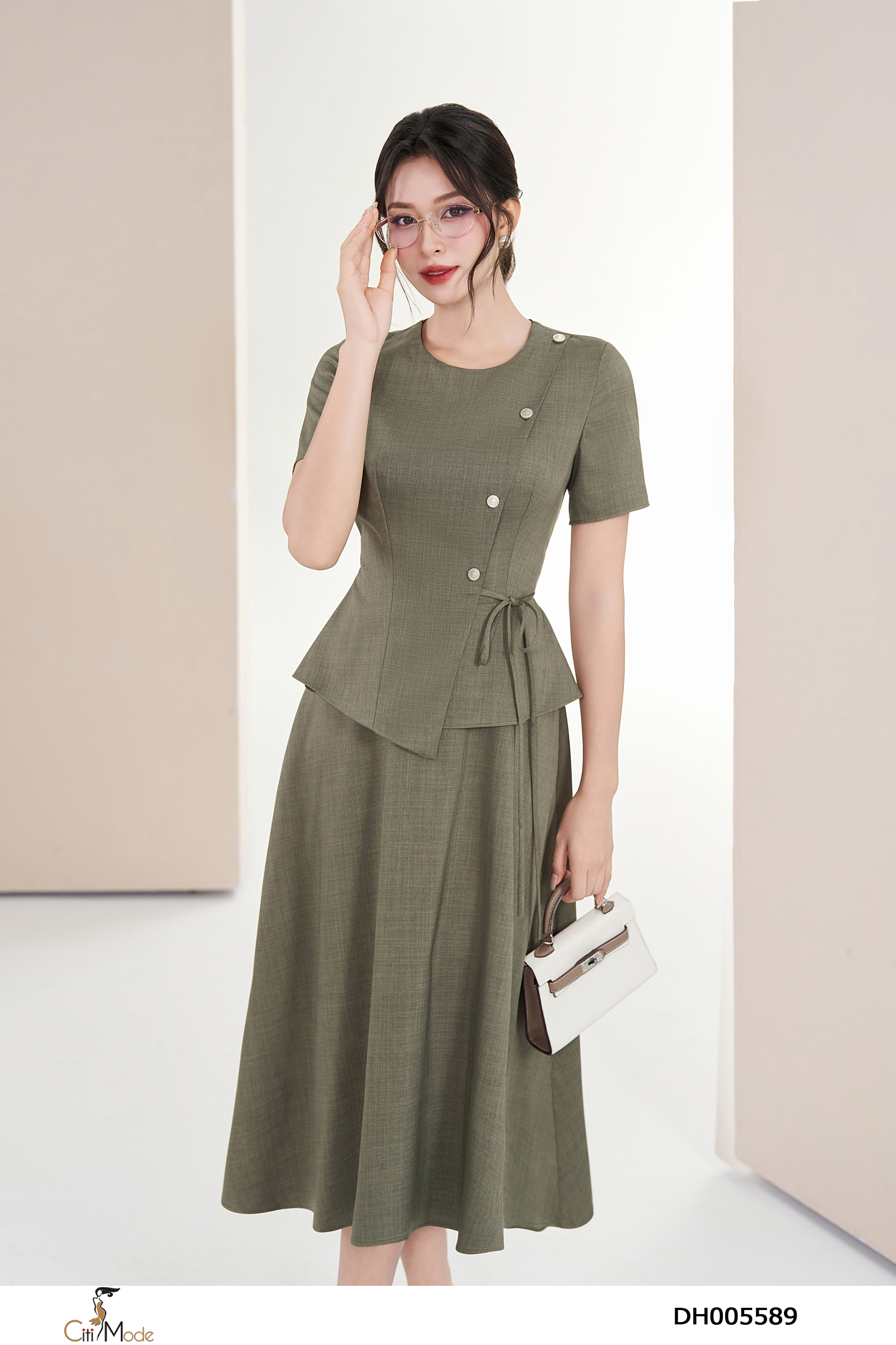 Đầm xòe peplum eo cách điệu tắt nơ cổ tròn tay cọc