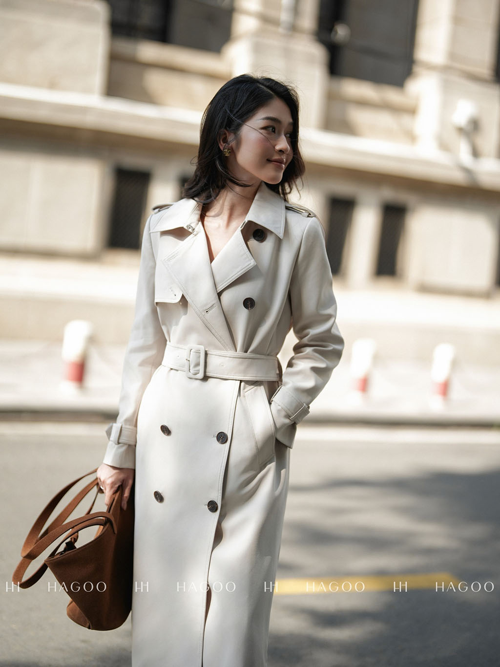 Double-breasted, belted trench coat