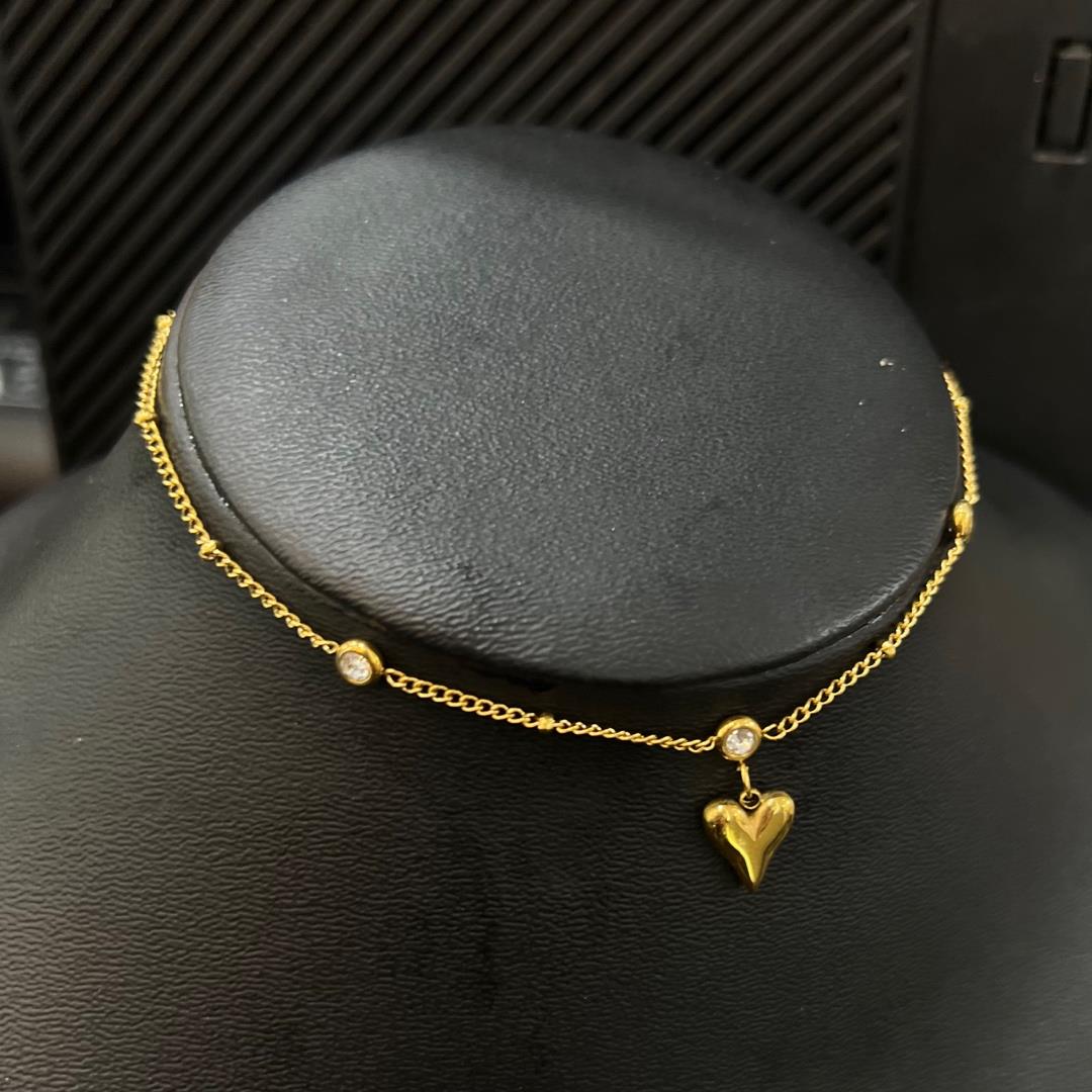 lắc chân titan sợi vàng charm trái tim khối mix kim cương 