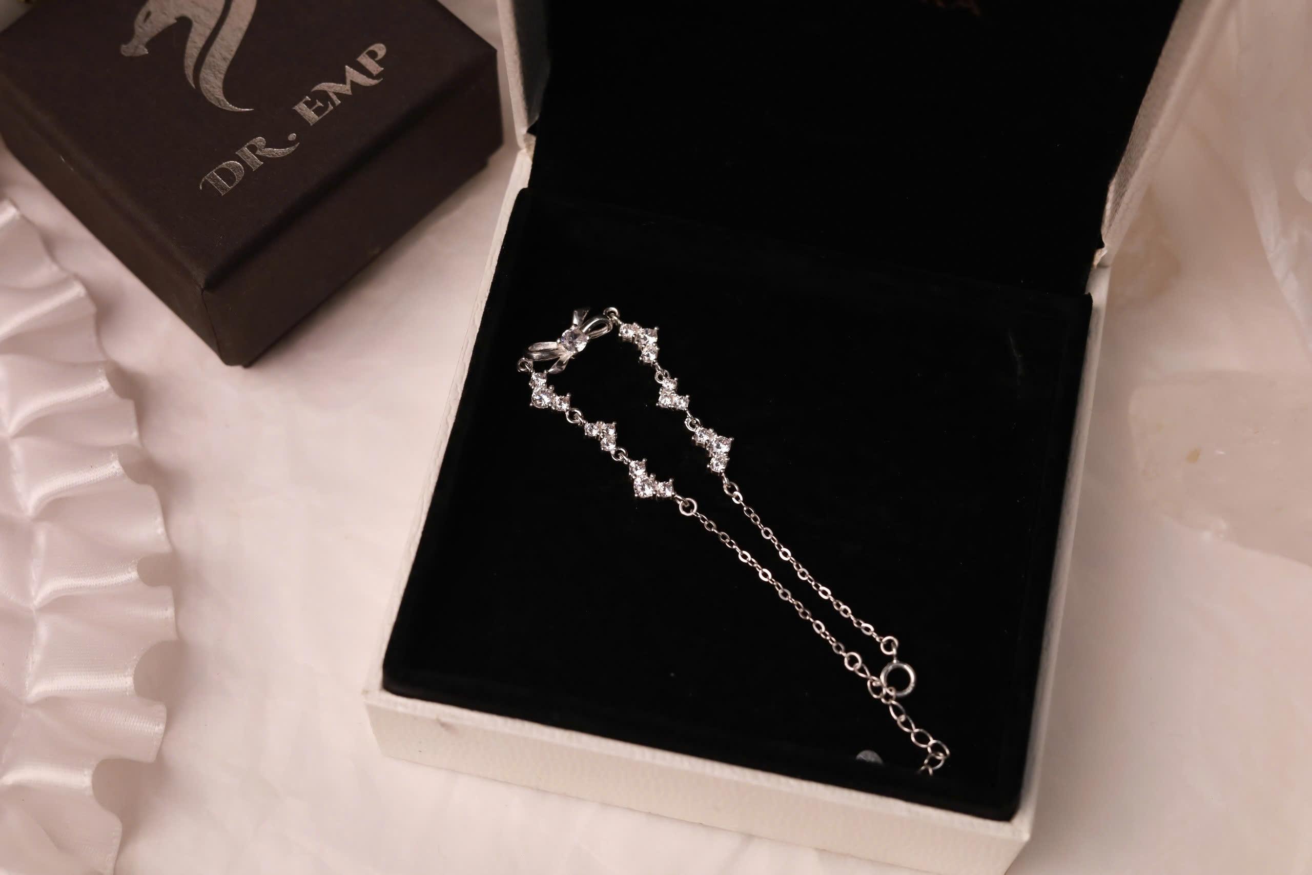 Vòng tay bạc nơ đính đá xi bạch kim