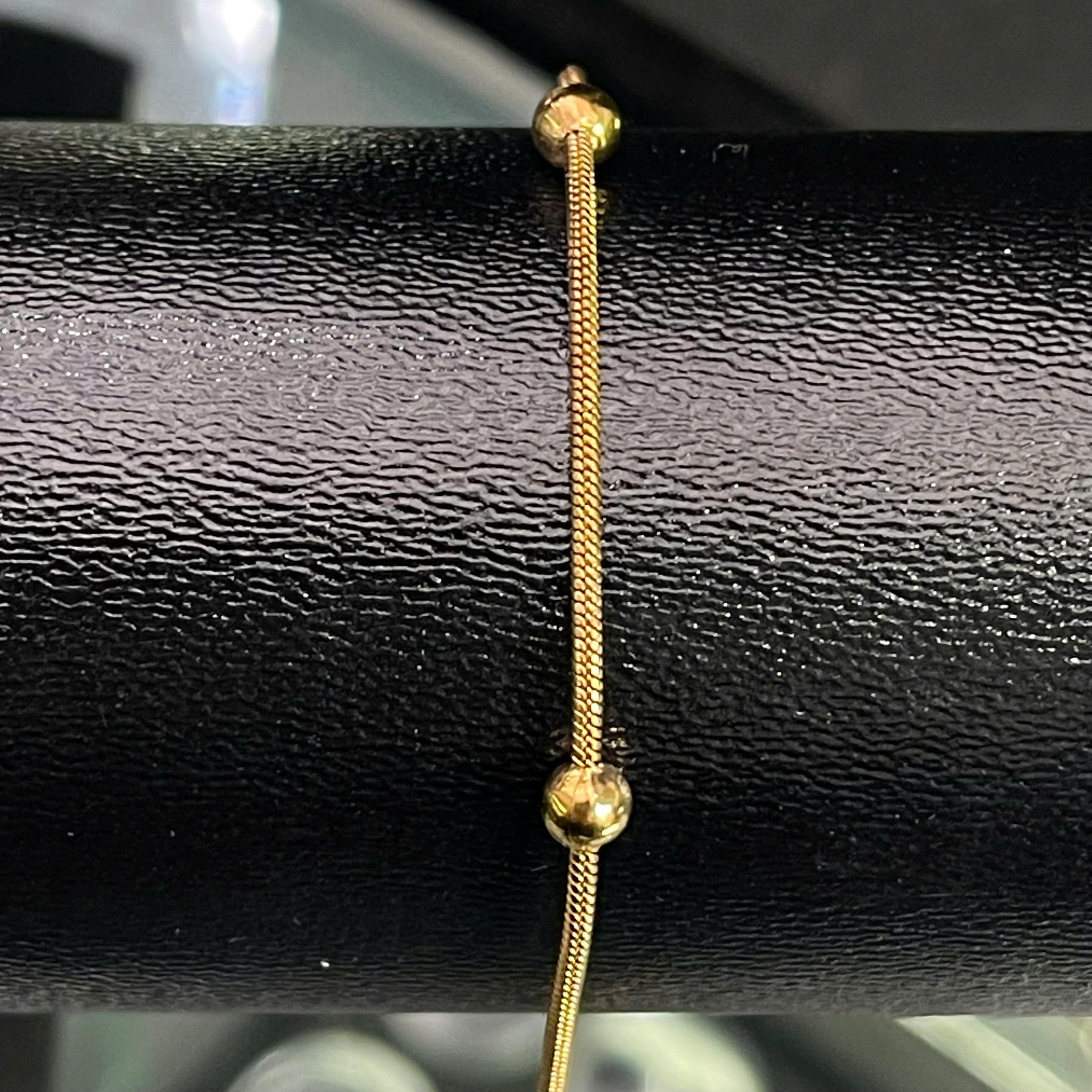 lắc chân sợi vàng 5 charm bi titan._thumbnail_2