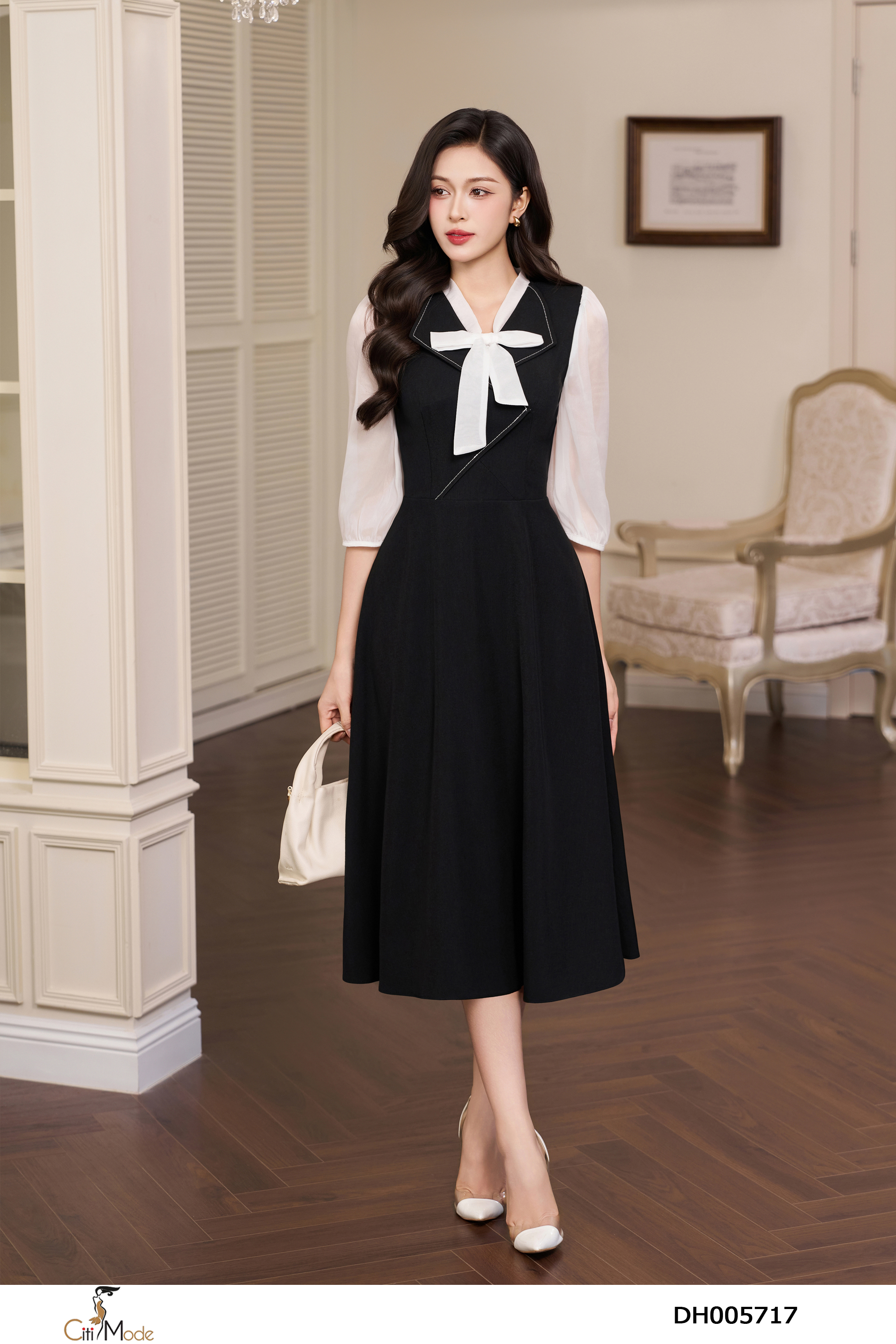 Đầm xòe đen phối tay tắng cổ nơ cách điệu