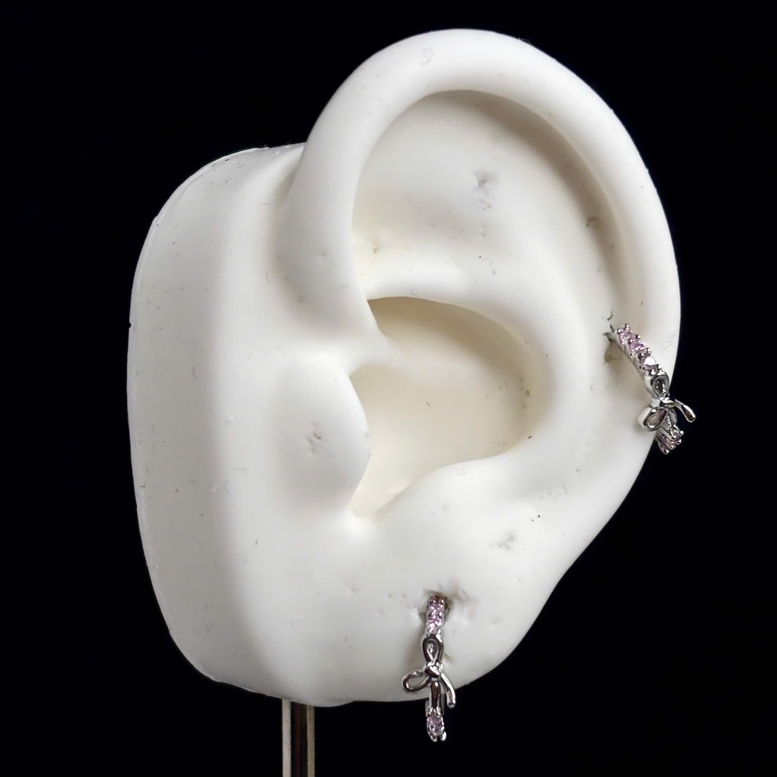 Khuyên vòng hợp kim mạ bạc nơ hồng size 8