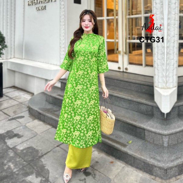 Bộ Áo Dài Cách Tân Gấm Dáng Suông Hoa Anh Đào Màu Xanh Cốm Cổ Cao 2cm Tay Lỡ