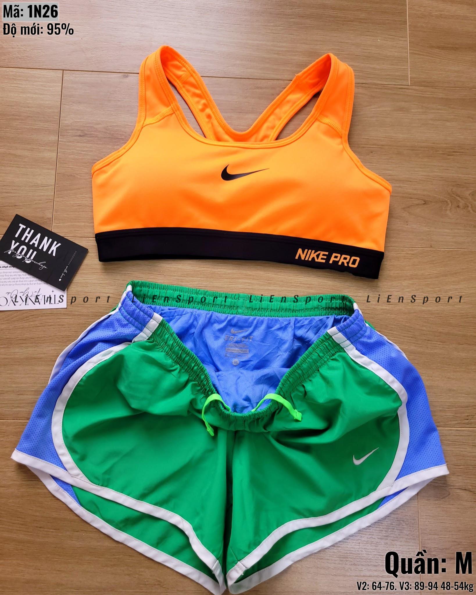 Nike Quần short thể thao Nữ Size M Xanh lá viền trắng Auth 2nd Vải dù nhẹ thoáng Lưới xanh dương hông Co giãn nhẹ Dây rút điều chỉnh Logo in Phù hợp tập gym chạy bộ Mã:1N26