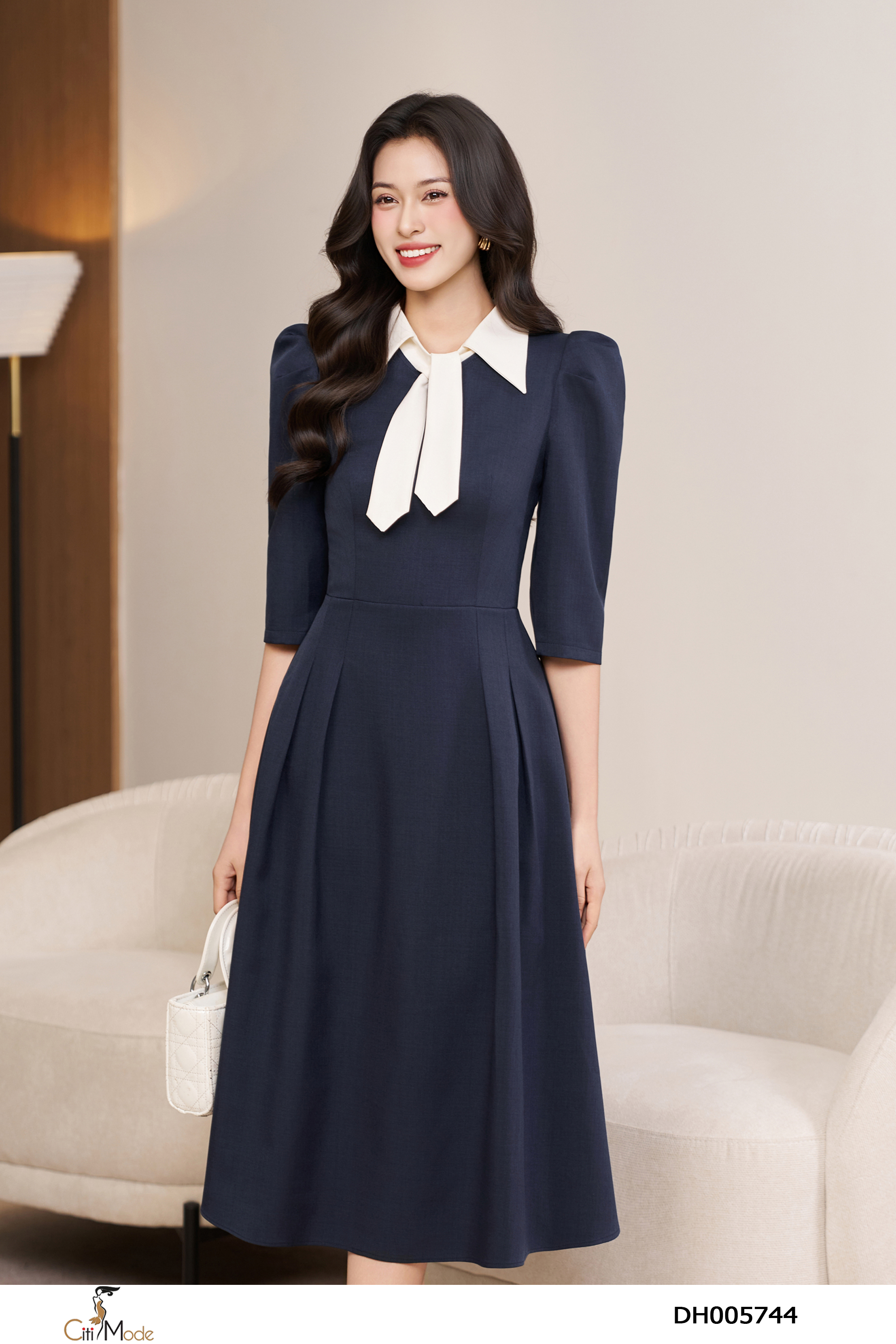 Đầm xòe tím than cổ đức vạt nơ tay lỡ