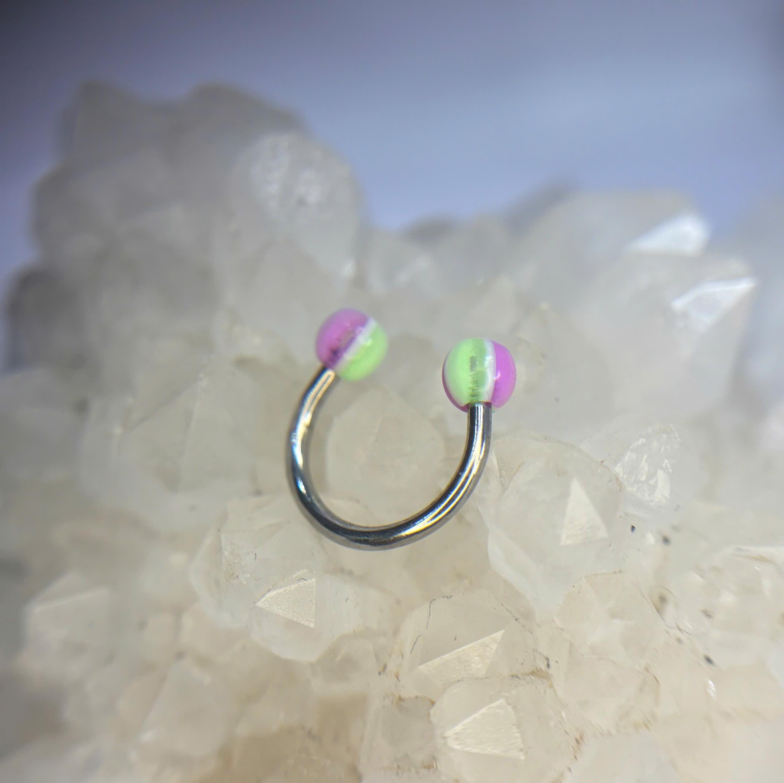 Septum hai quả bóng xanh hồng