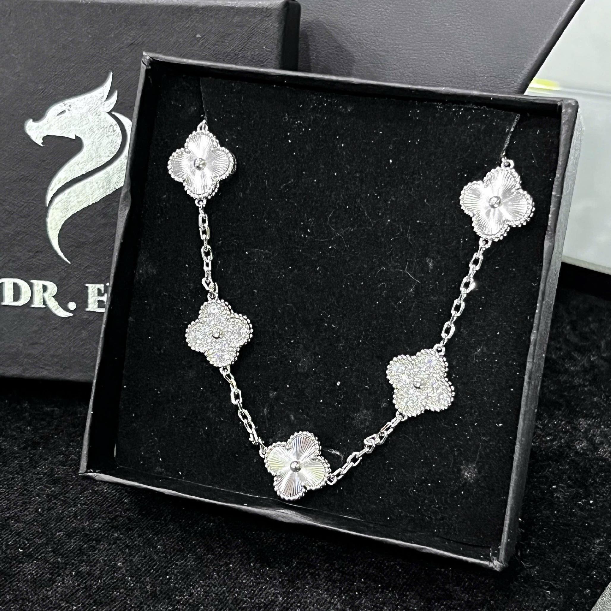 vòng tay titan mạ vàng trắng vancleef to bạc sọc mix bạc kim cương