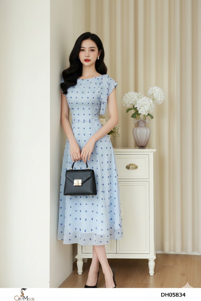 Đầm xòe chấm bi xanh cổ vạt vai cách điệu