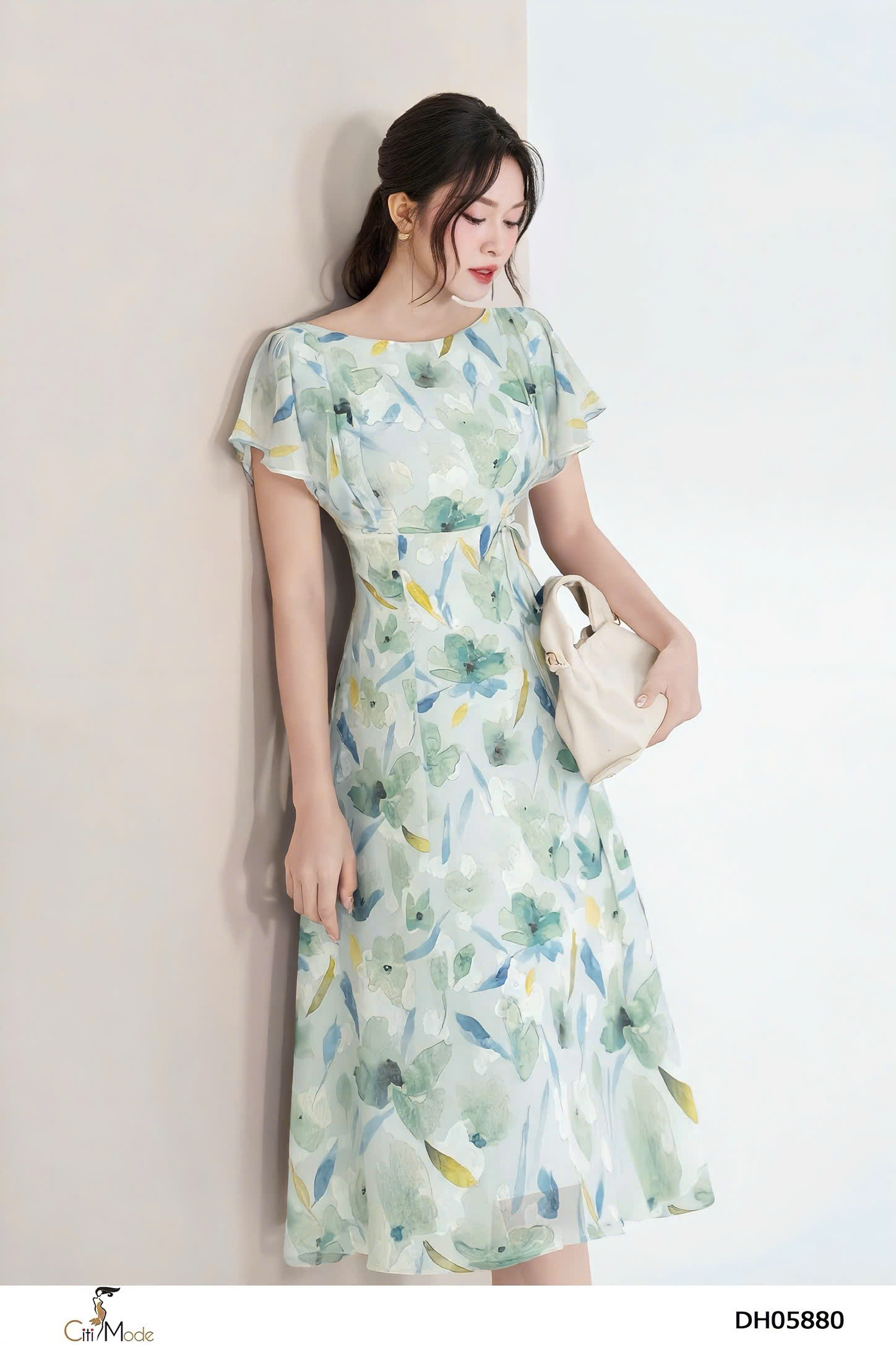 Đầm xòe liên hoa nổi 3D tay cách điệu đính nơ eo