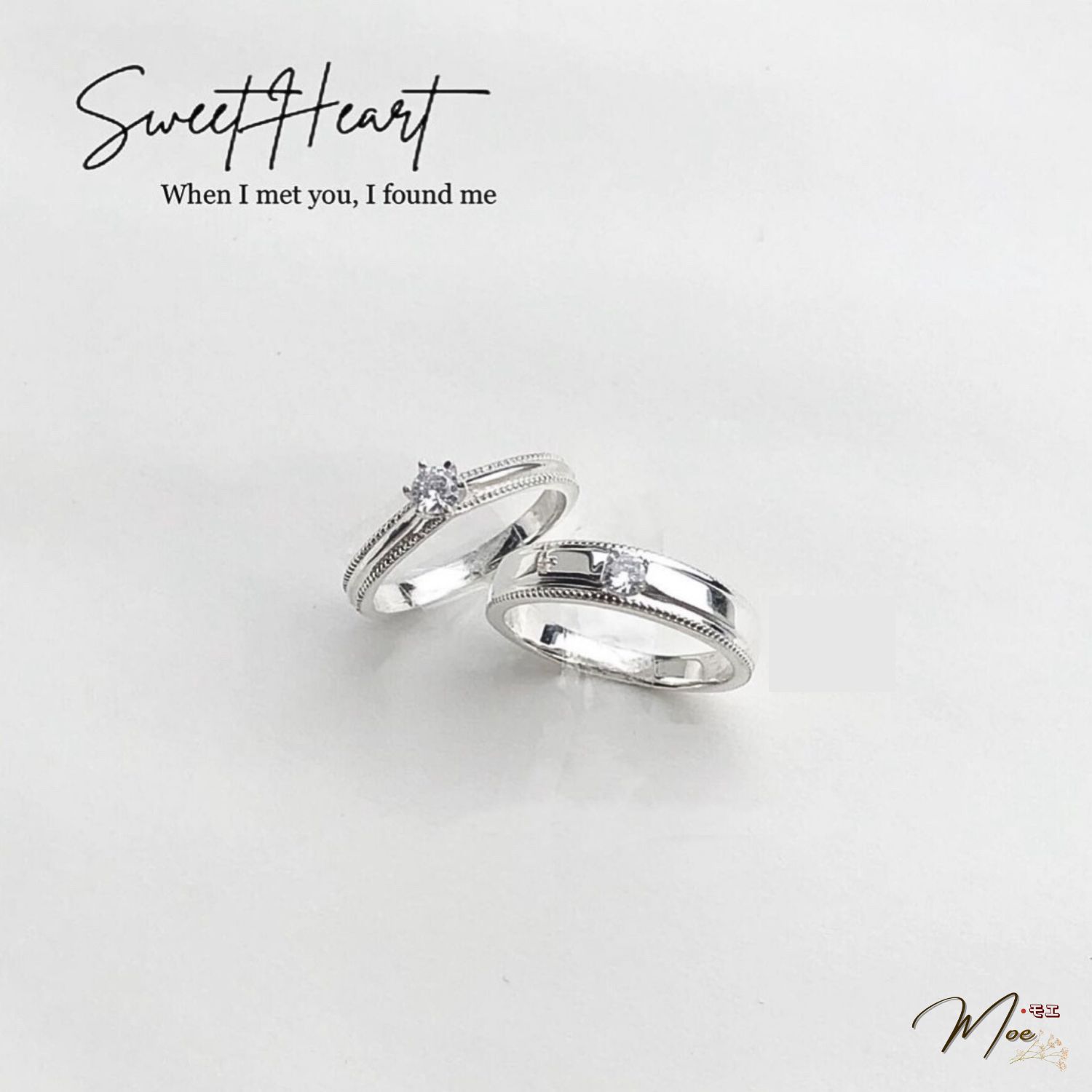 ĐN85 - Nhẫn đôi đá chủ viền trơn sang trọng