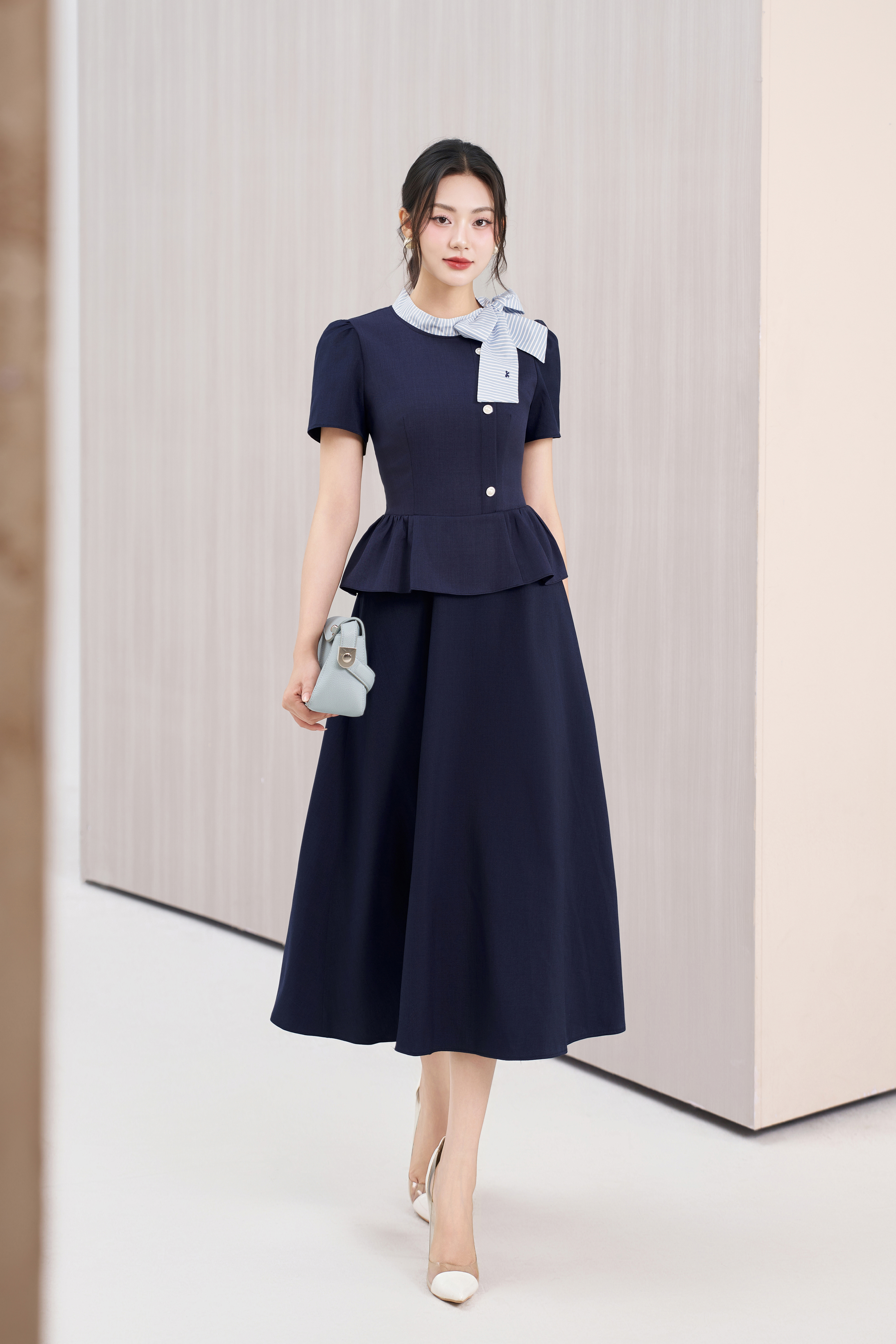 Đầm xòe peplum tím than cổ phối kẻ nơ