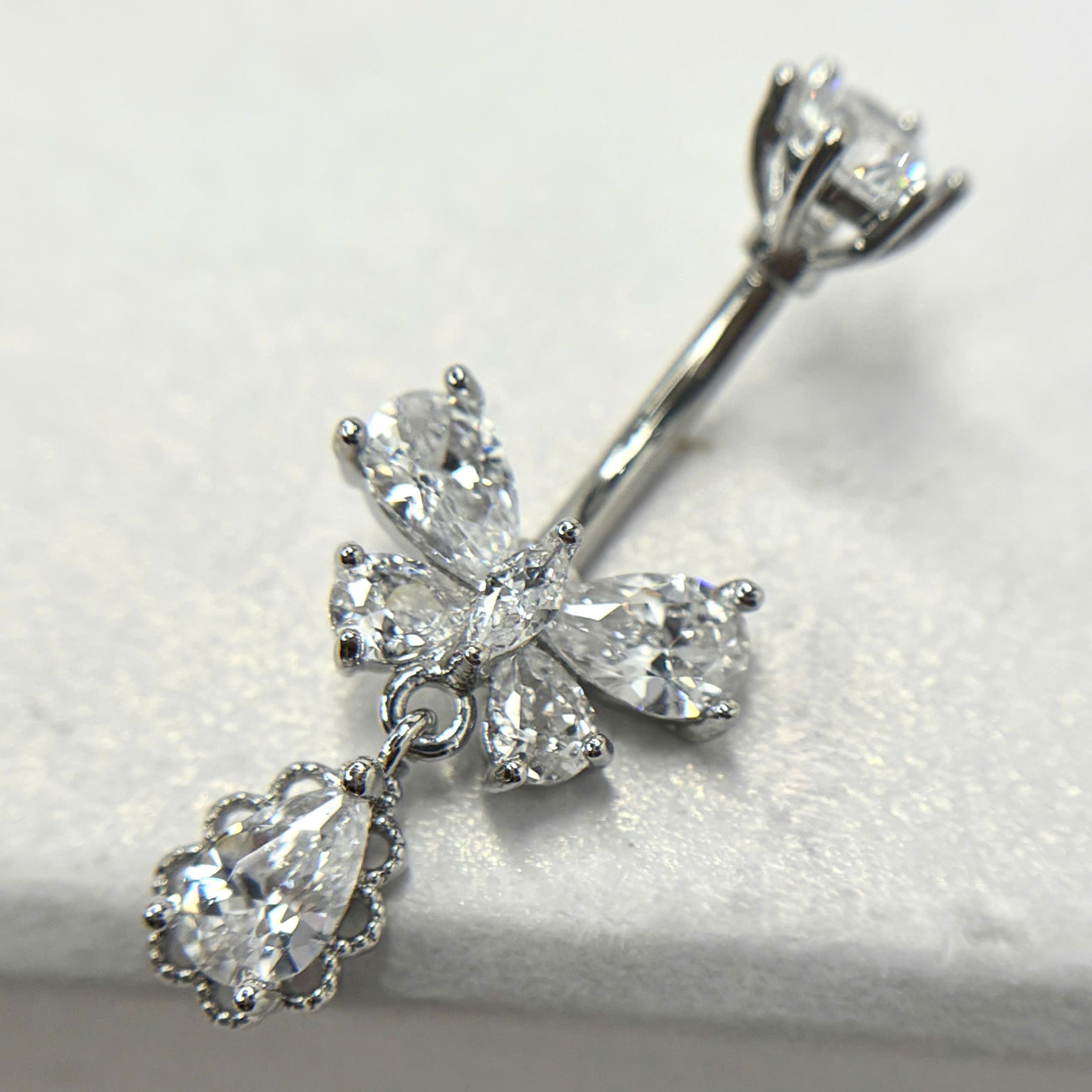 Rốn bướm trắng rơi đá viền 2 bên