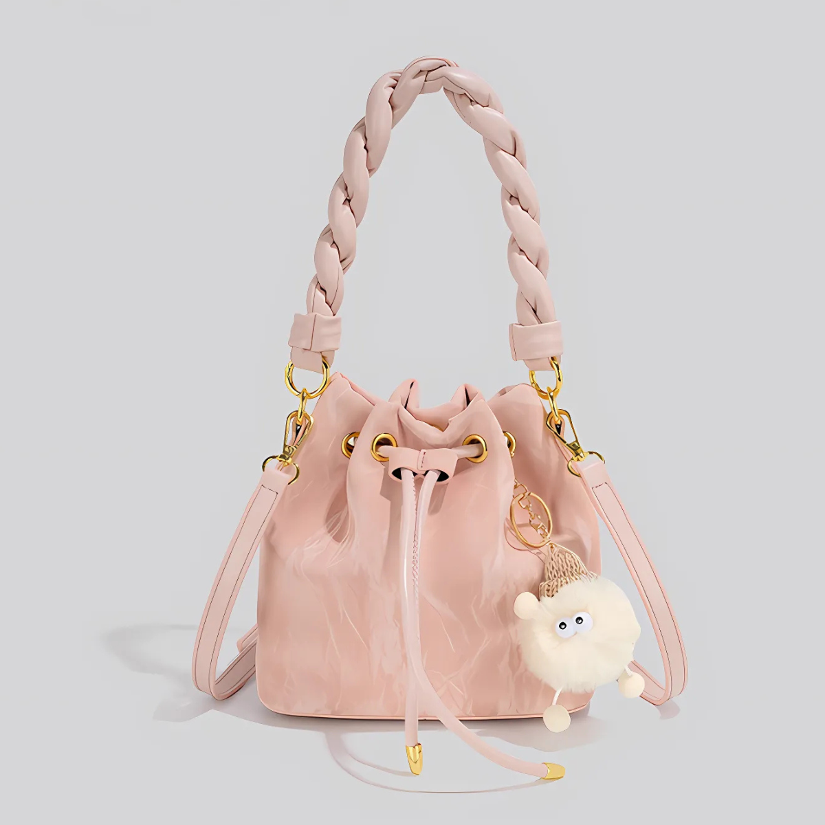 UHE Moon Puff 2509 – túi bucket da cao cấp, quai xoắn thời trang, charm bông xinh xắn, 3 màu hồng - trắng kem - xám bạc