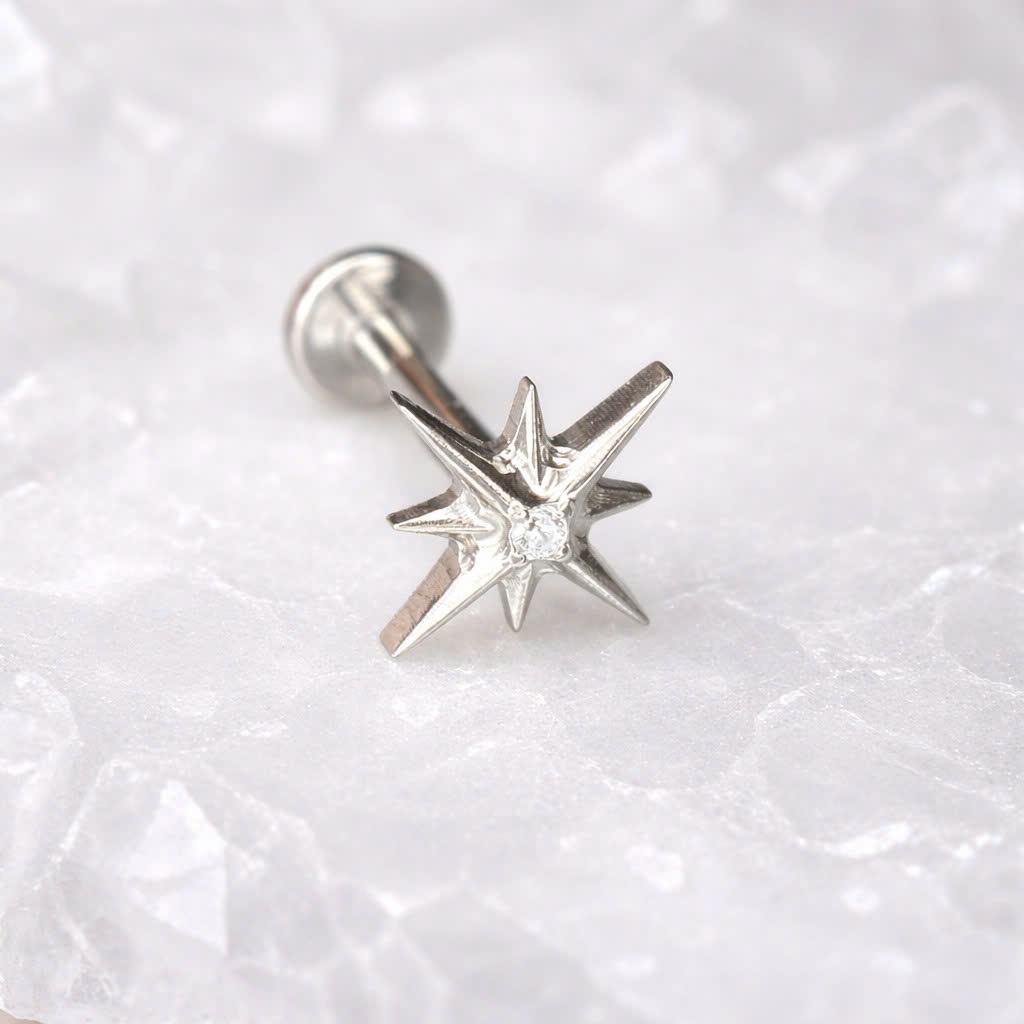 Khuyên kiểu titan sao nhiều cánh