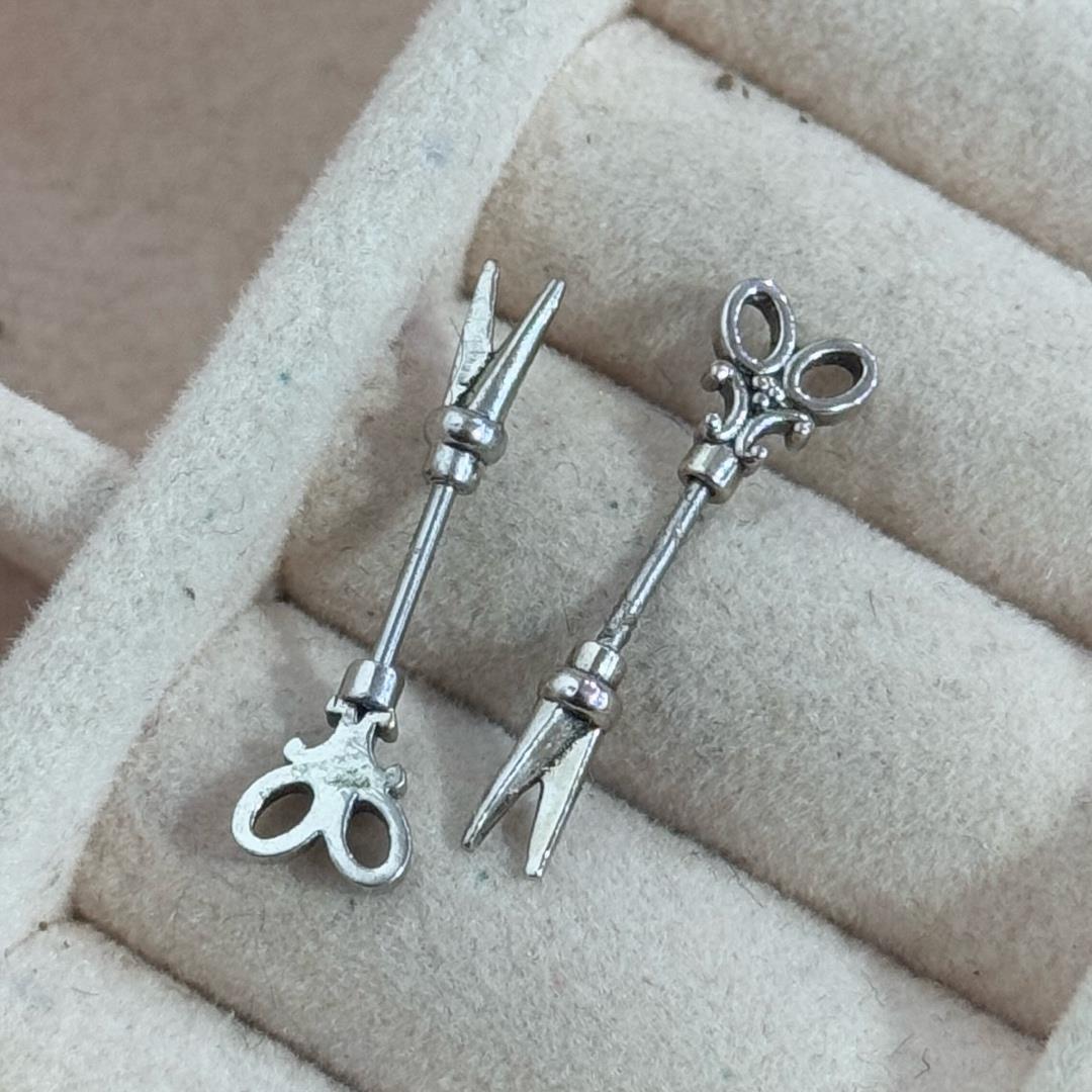 Khuyên kiểu vertical cây kéo