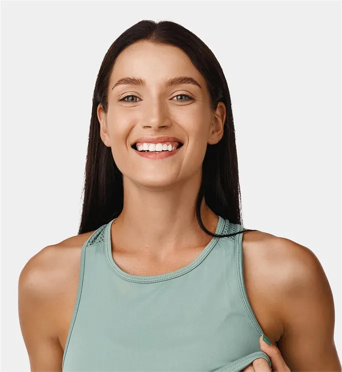 lovely-satisfied-freckled-female-with-crisp-hair-has-gentle-smile-dressed-striped-black-white-shirt-rejoices-positive-moments-life-isolated-wall-people-emotions-4