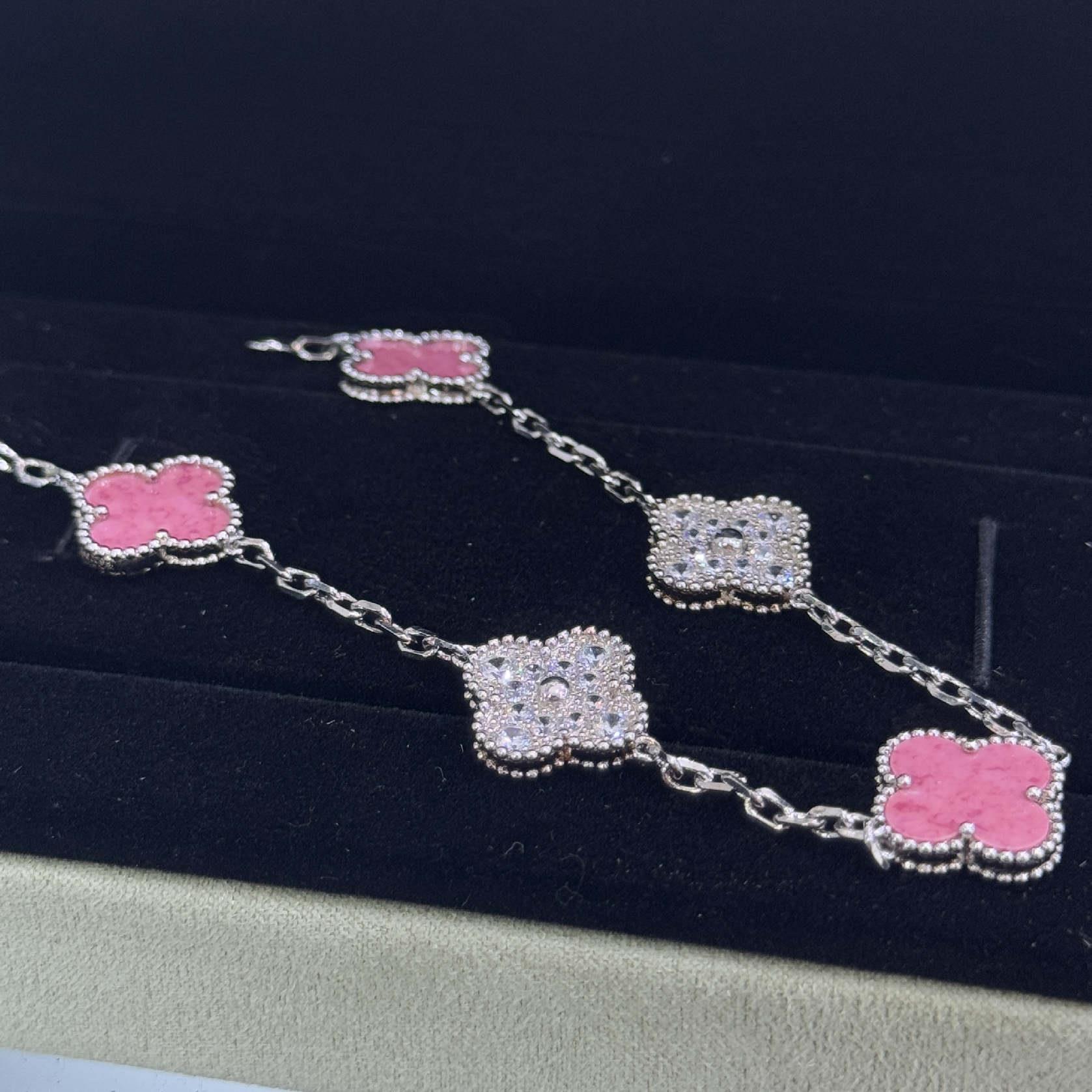 vòng tay titan mạ vàng trắng vancleef to kim cương mĩ hồng