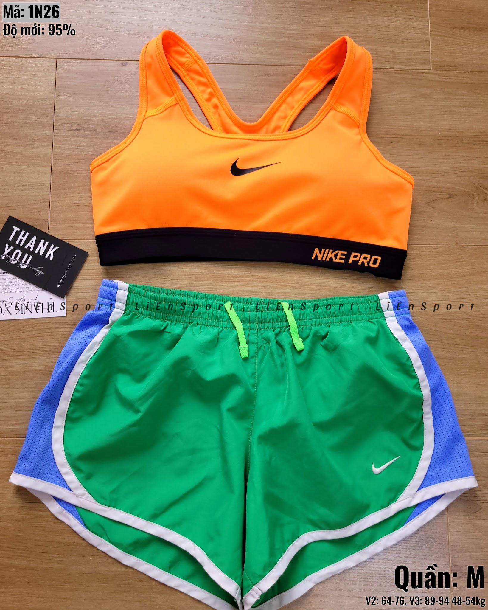 Nike Quần short thể thao Nữ Size M Xanh lá viền trắng Auth 2nd Vải dù nhẹ thoáng Lưới xanh dương hông Co giãn nhẹ Dây rút điều chỉnh Logo in Phù hợp tập gym chạy bộ Mã:1N26