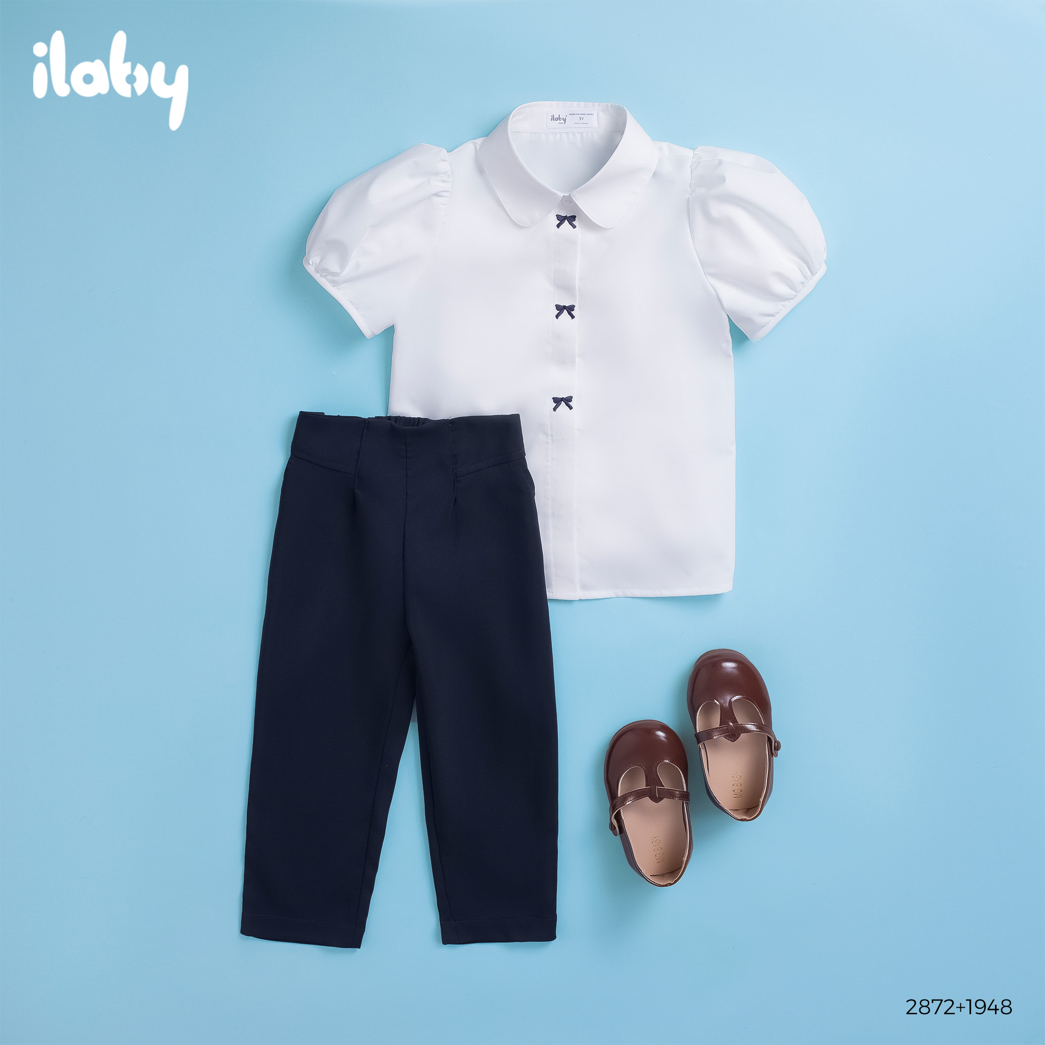 Sơ mi thêu nơ nẹp áo