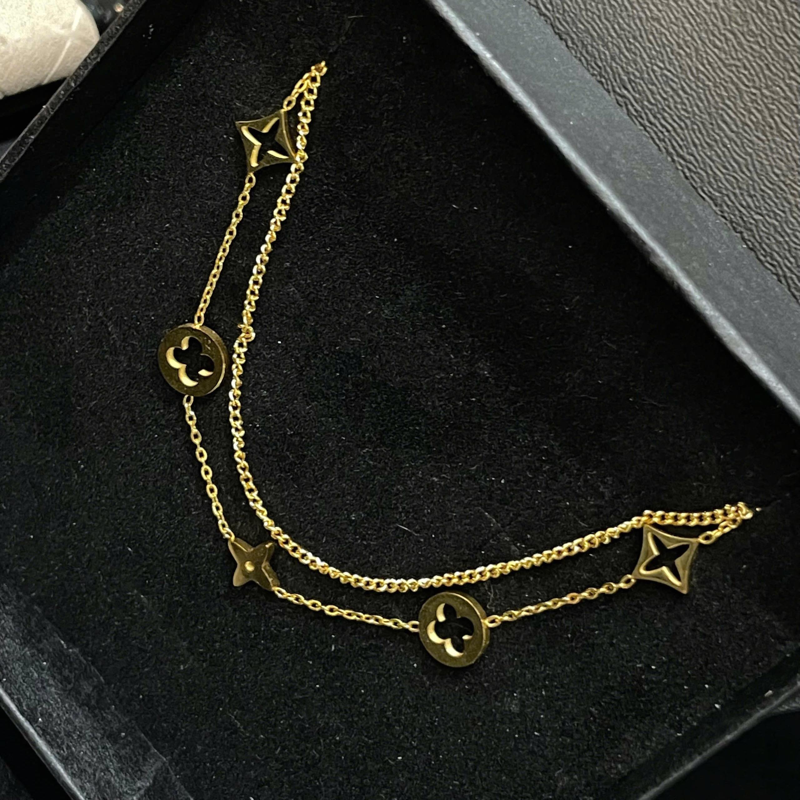 lắc chân titan hai sợi mảnh vàng charm LV cỏ bốn lá _thumbnail_1