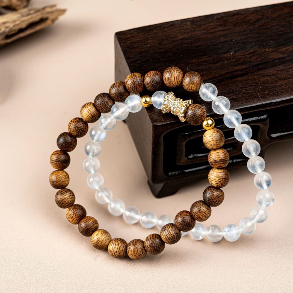 PT162 - Chuỗi vòng trầm 54 hạt mix đá moonstone nơ đá xi vàng (hợp kim mạ vàng)