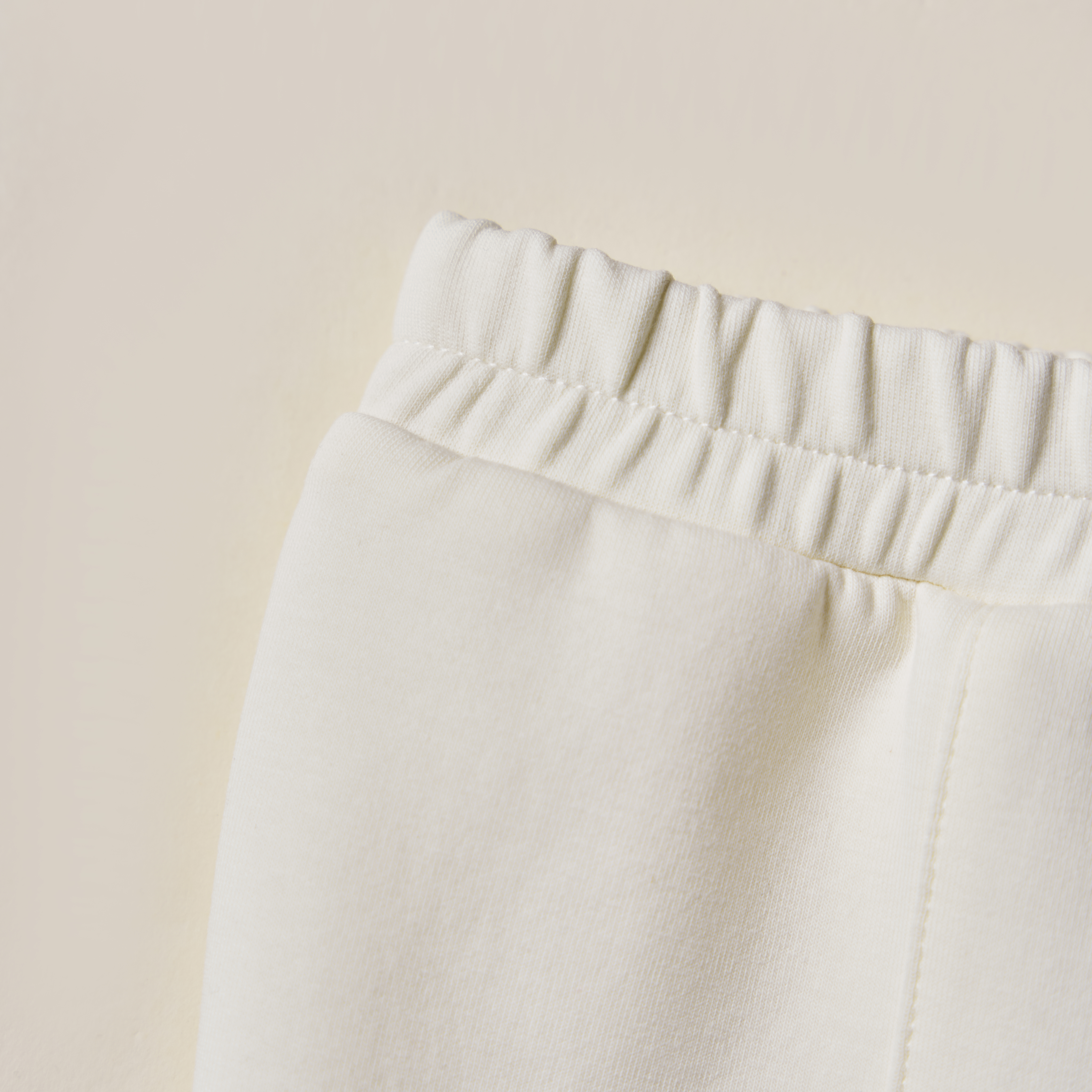 Quần nỉ ống loe xẻ gấu