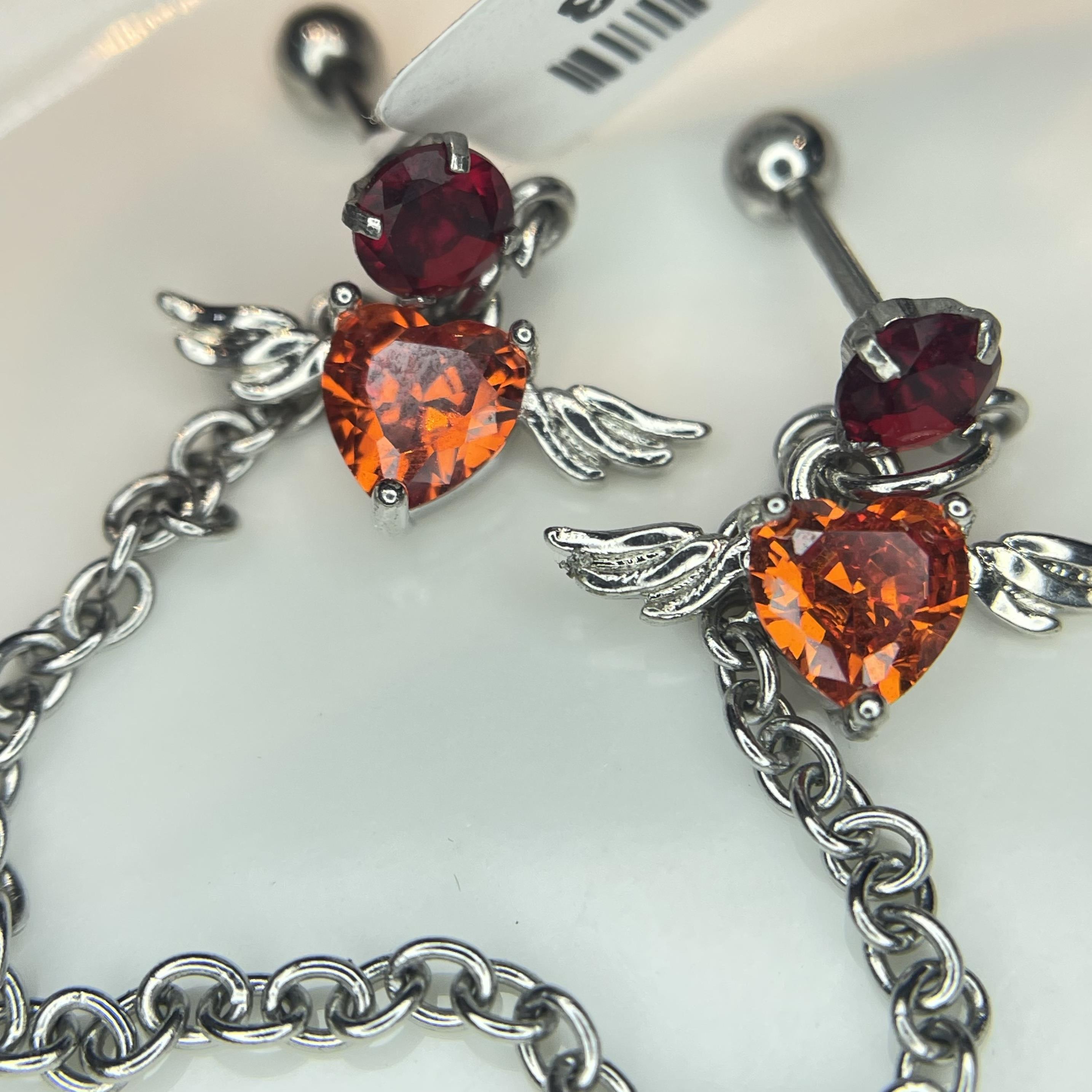 Khuyên kiểu xích đôi cánh thiên thần đỏ loè đỏ loẹt xích đơn.