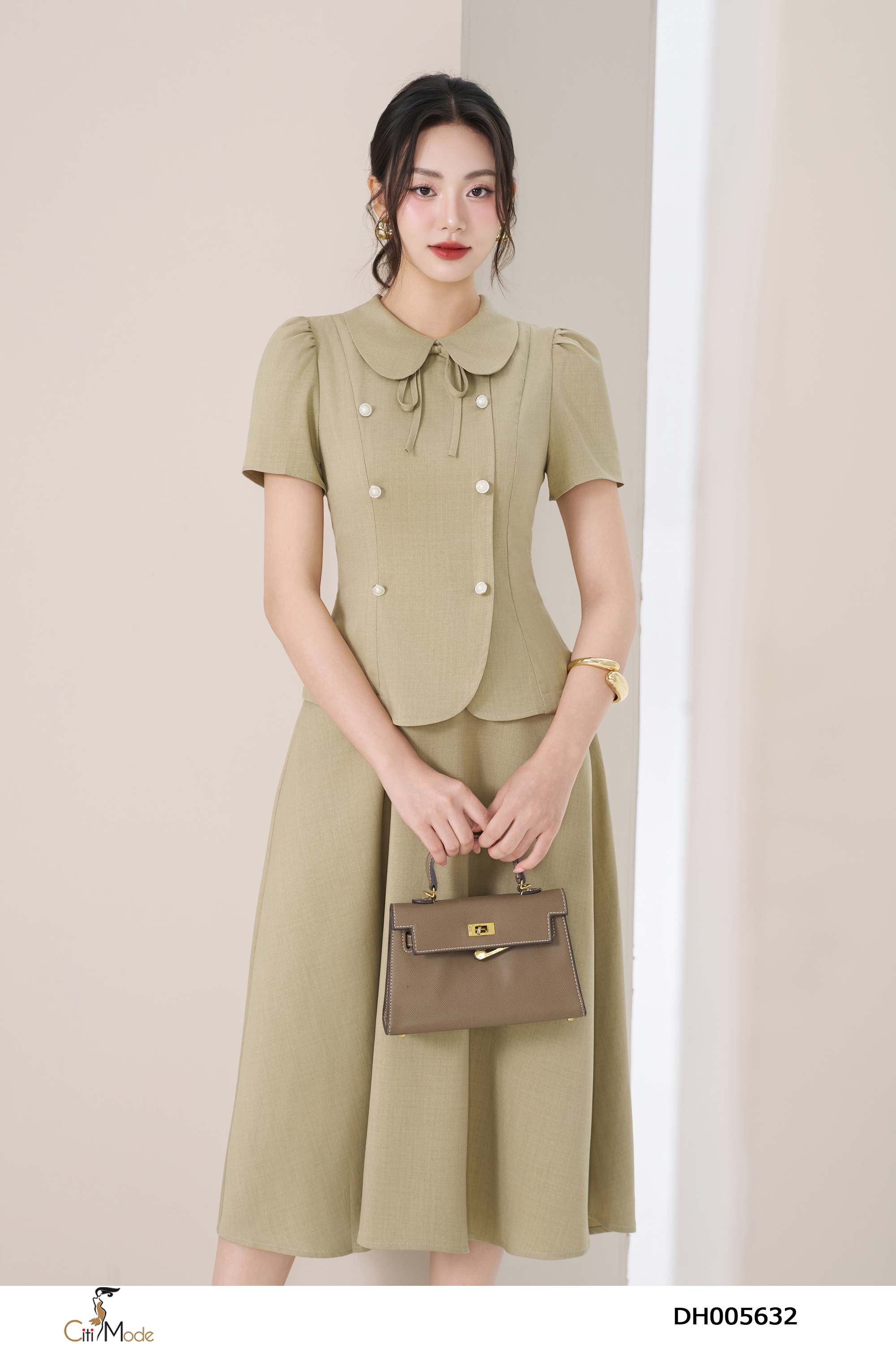 Đầm xòe peplum bơ cổ sen đính nơ