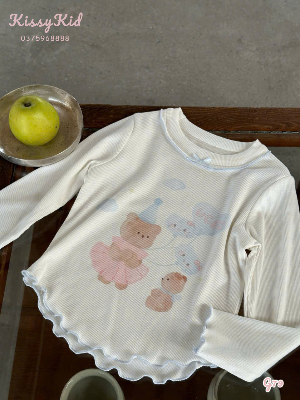 (G79) Áo thun mỏng màu kem hoạ tiết gấu cầm chùm bóng Ucee Heyduck_thumbnail_0