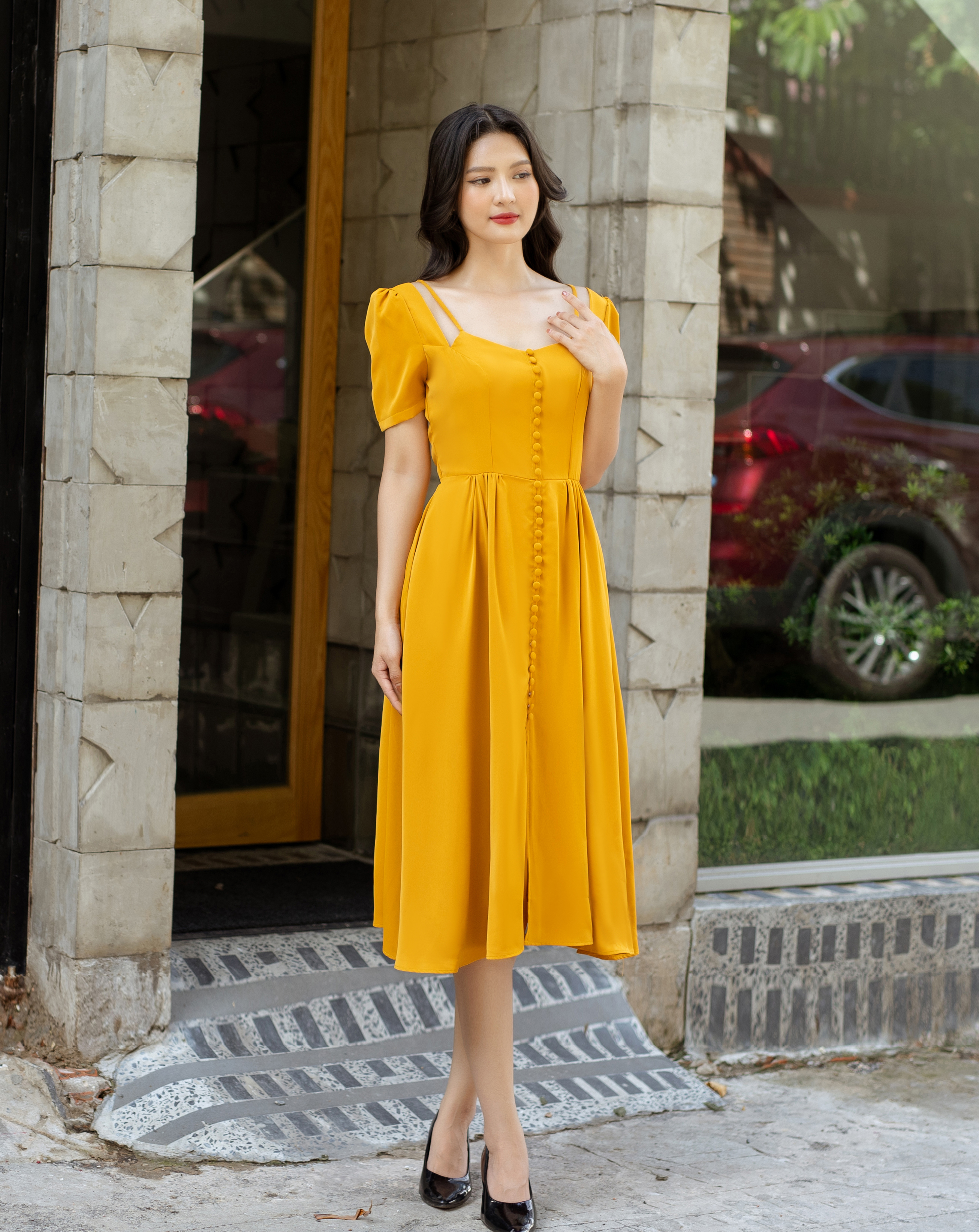 Đầm xòe tiểu thư tay con cut out đính nút