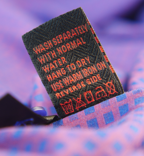 vecteezy_clothing-label-with-care-symbols-on-a-cloth_49590294