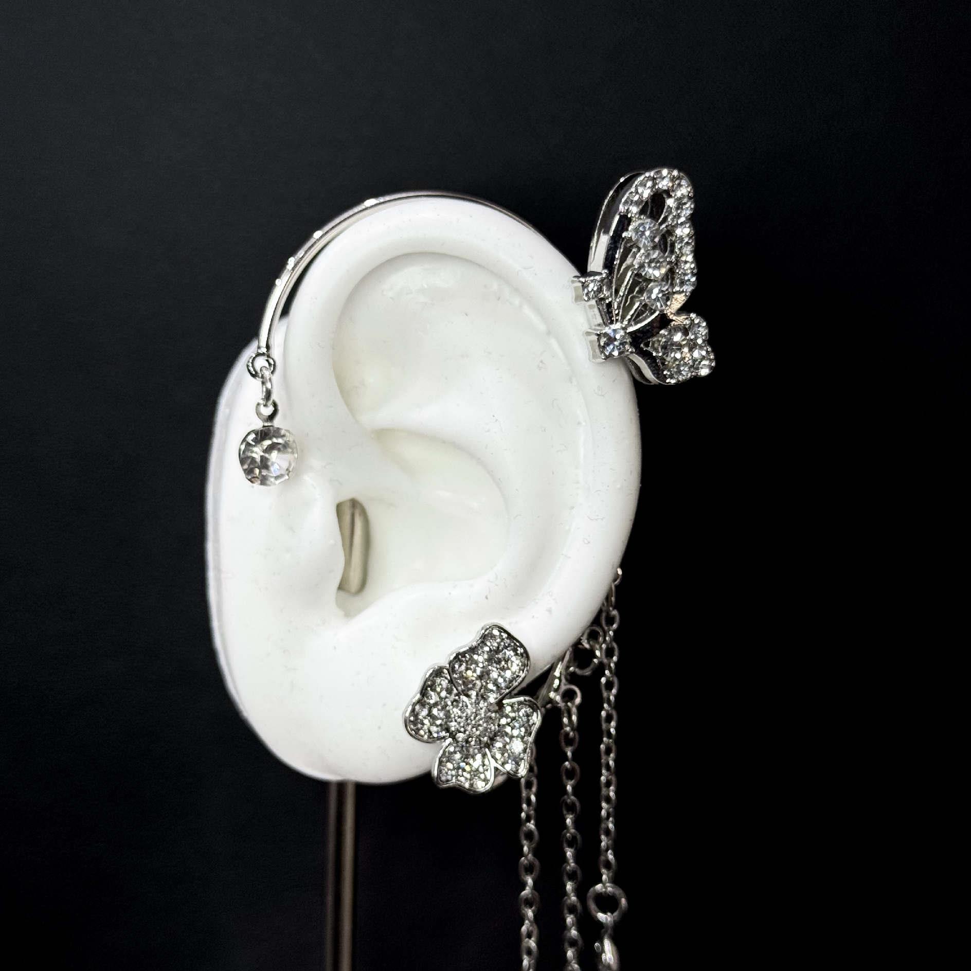 khuyên kẹp giả vành bướm kim cương và hoa to kim cương tua rua rơi tai trái 