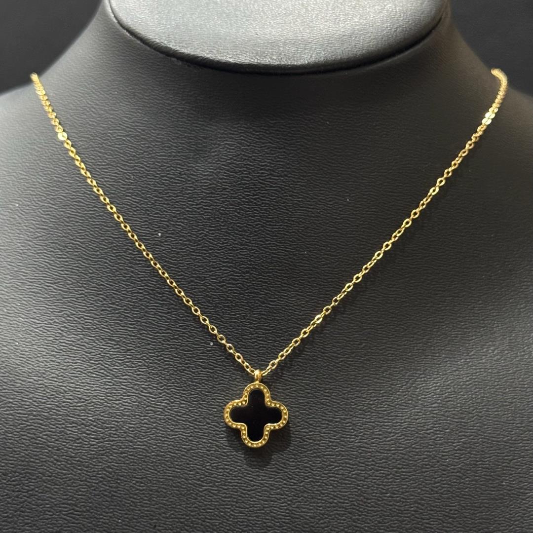 vòng cổ titan van cleef cỏ bốn lá hai mặt trắng đen xà cừ dây vàng_thumbnail_1