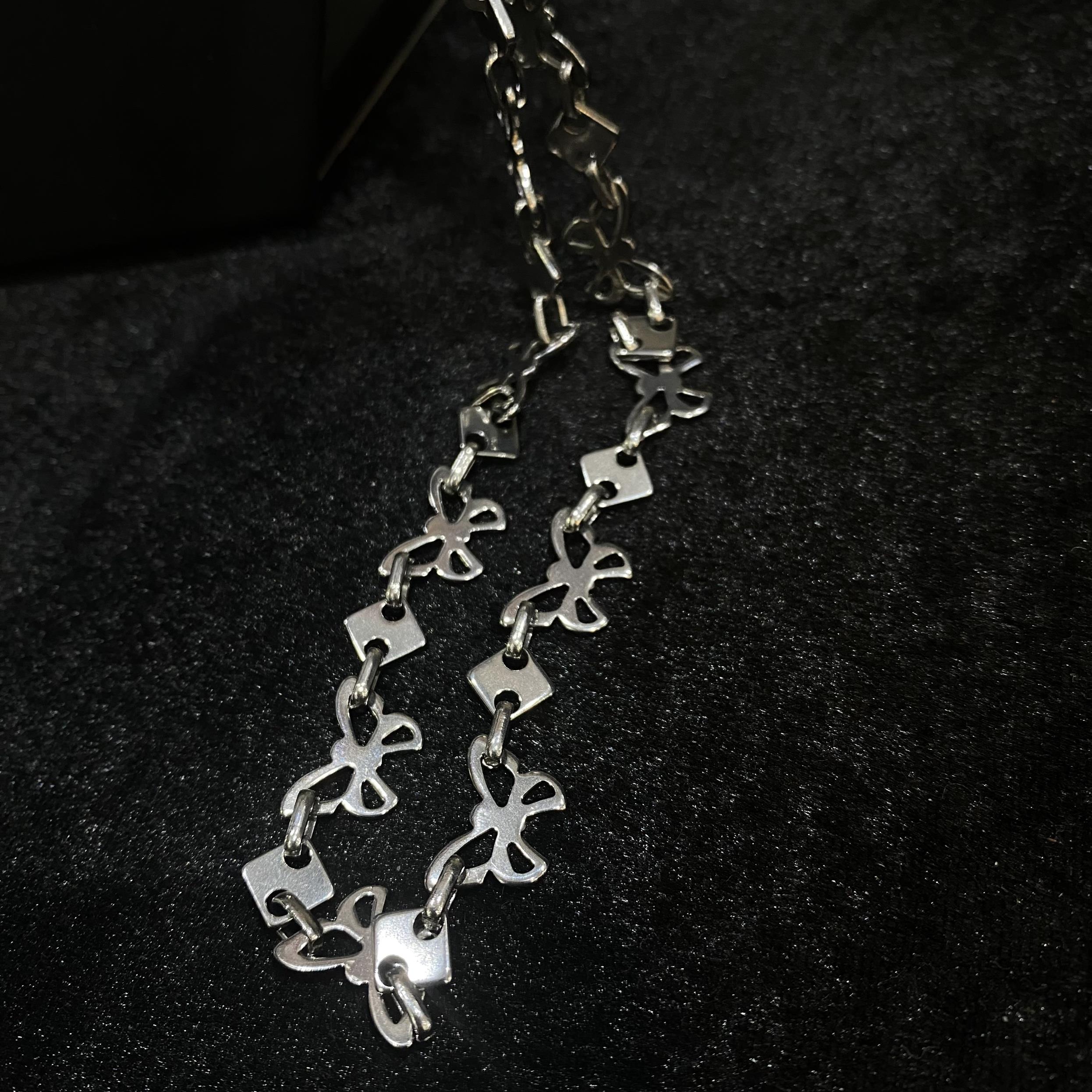 vòng cổ titan charm bướm nơ trơn bốn cánh dẹt dài