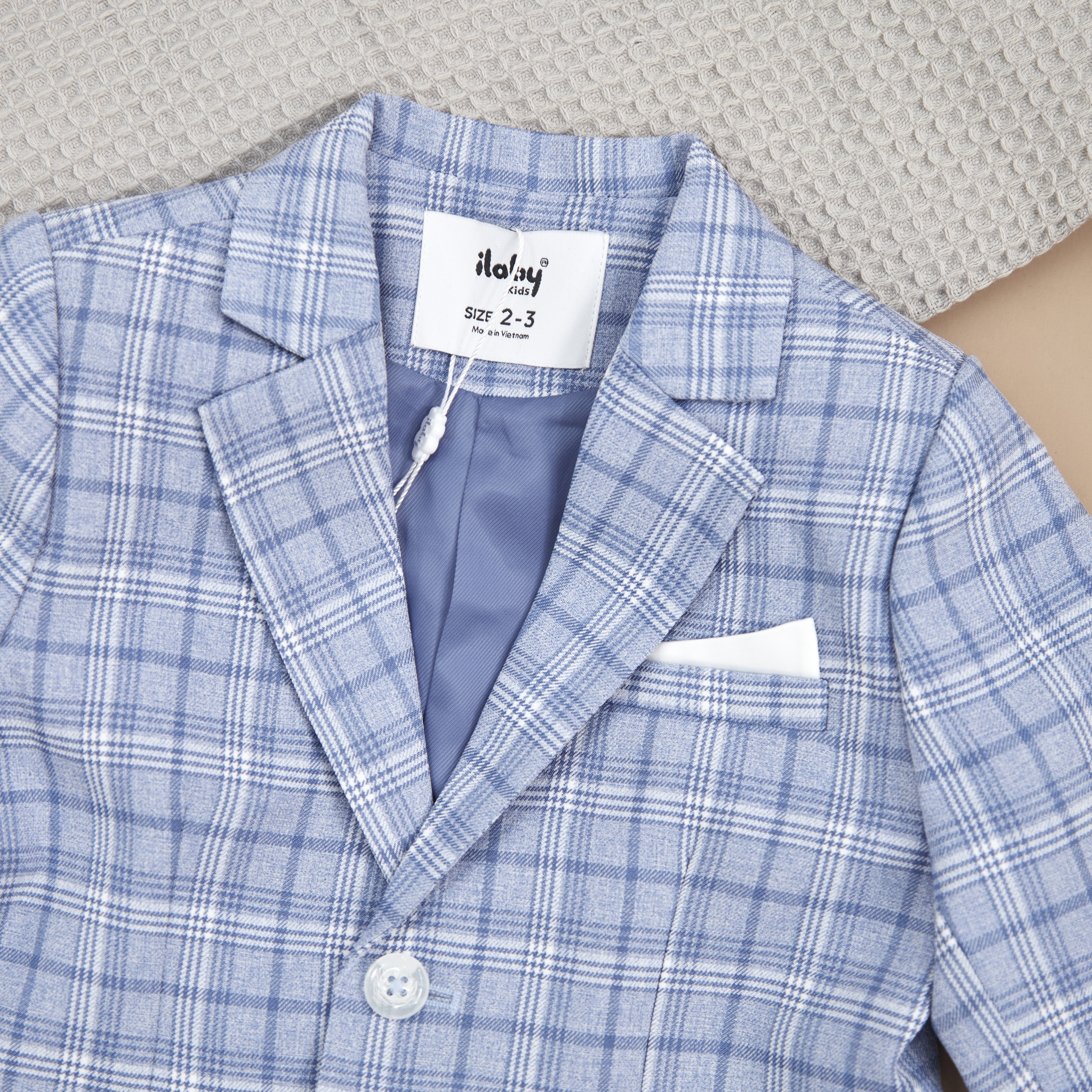 Áo suits kẻ túi giả khăn gấp