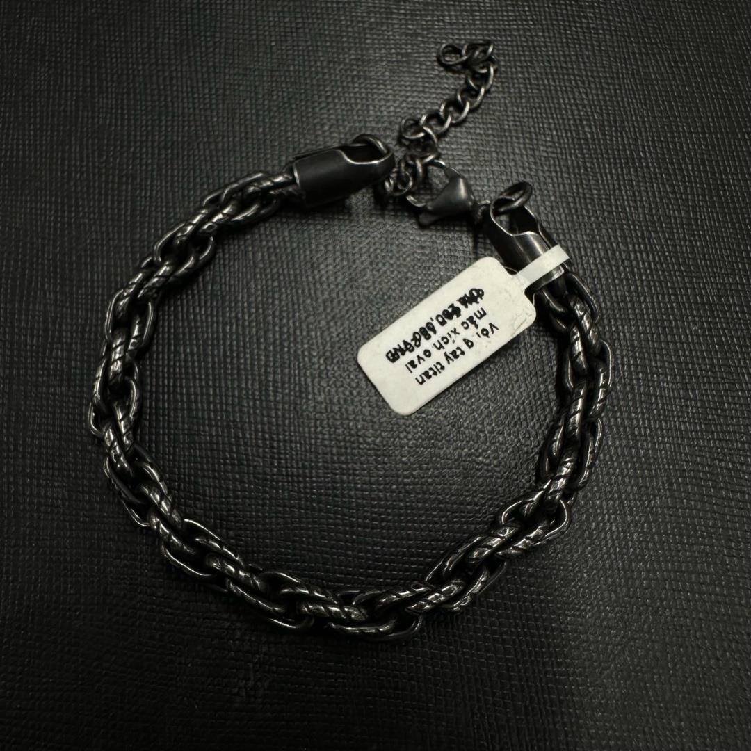 Vòng tay titan mắc xích oval dày đen 18 23cm.
