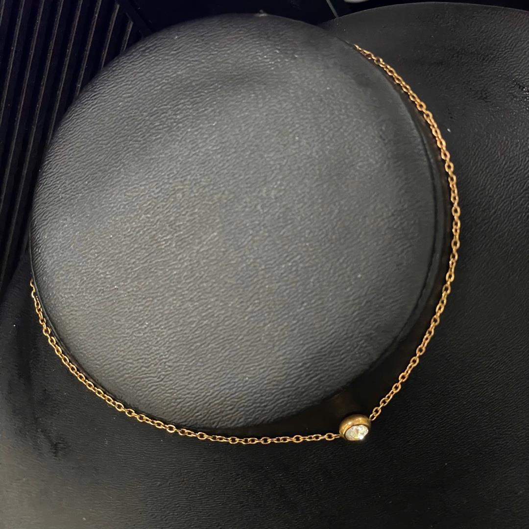 lắc chân titan màu vàng charm bi đính kim cương._thumbnail_3